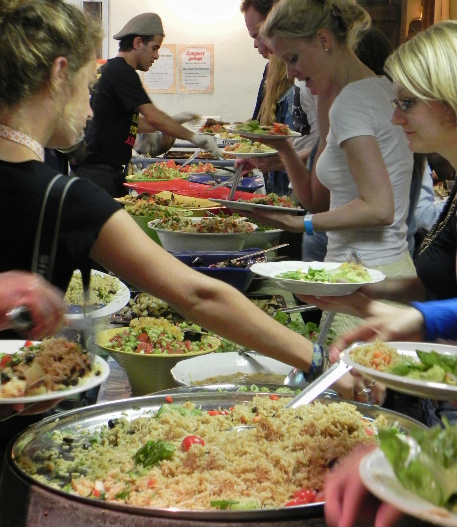 ATTEND A COMMUNITY MEAL