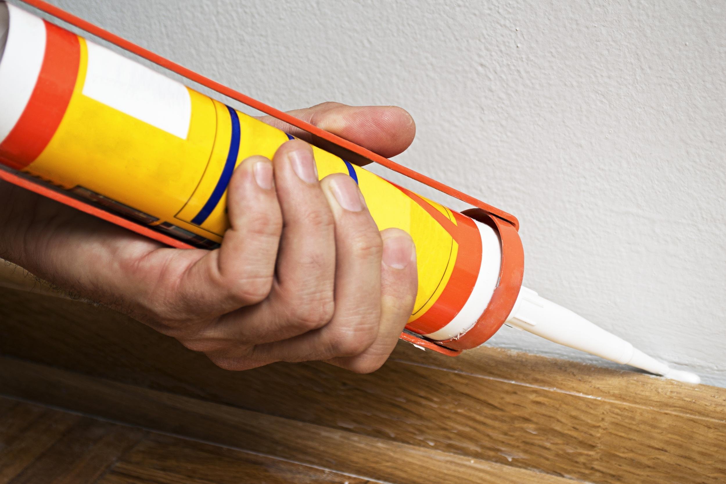 USE CAULK AND WEATHER STRIPPING