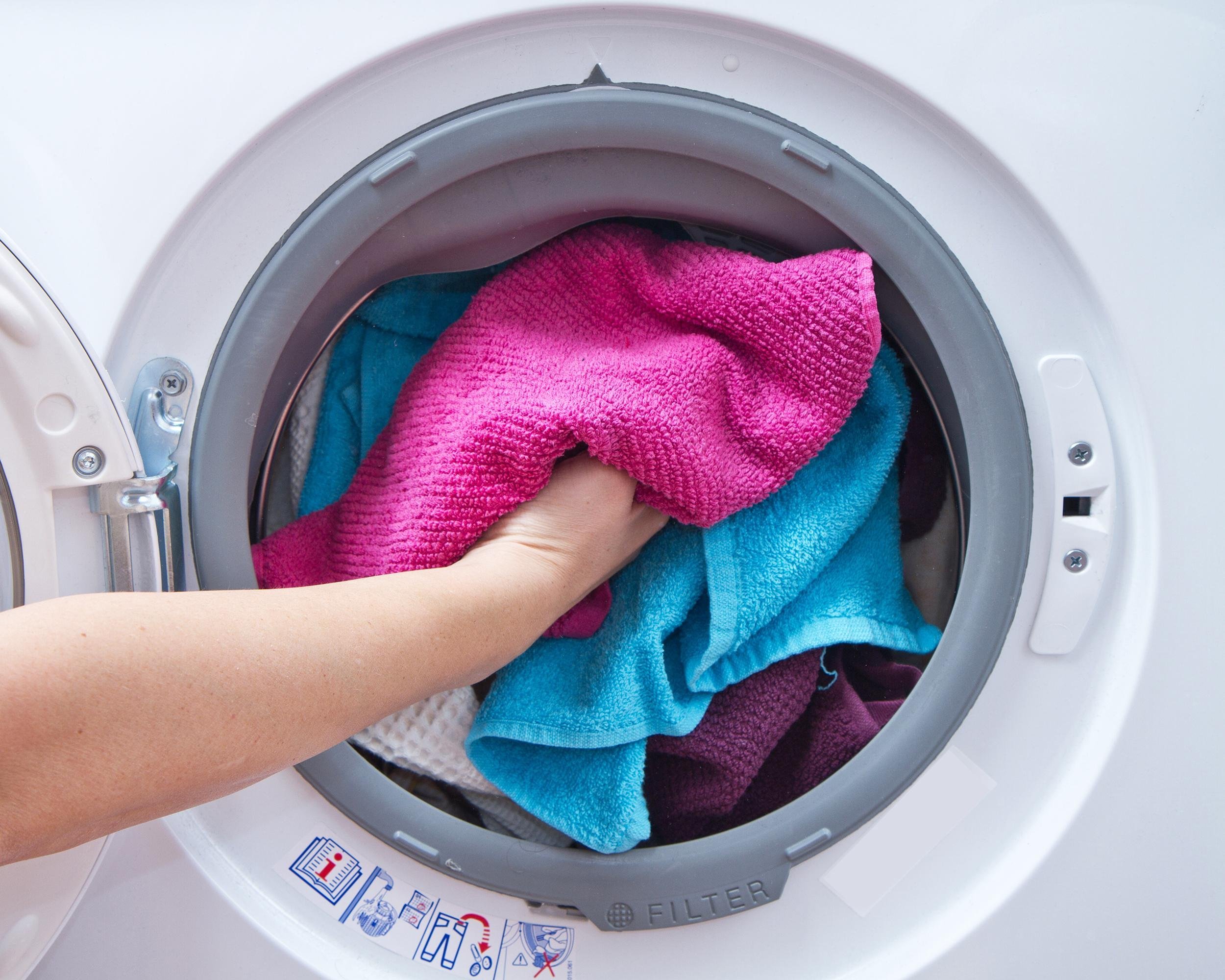 TOSS PADS IN THE LAUNDRY