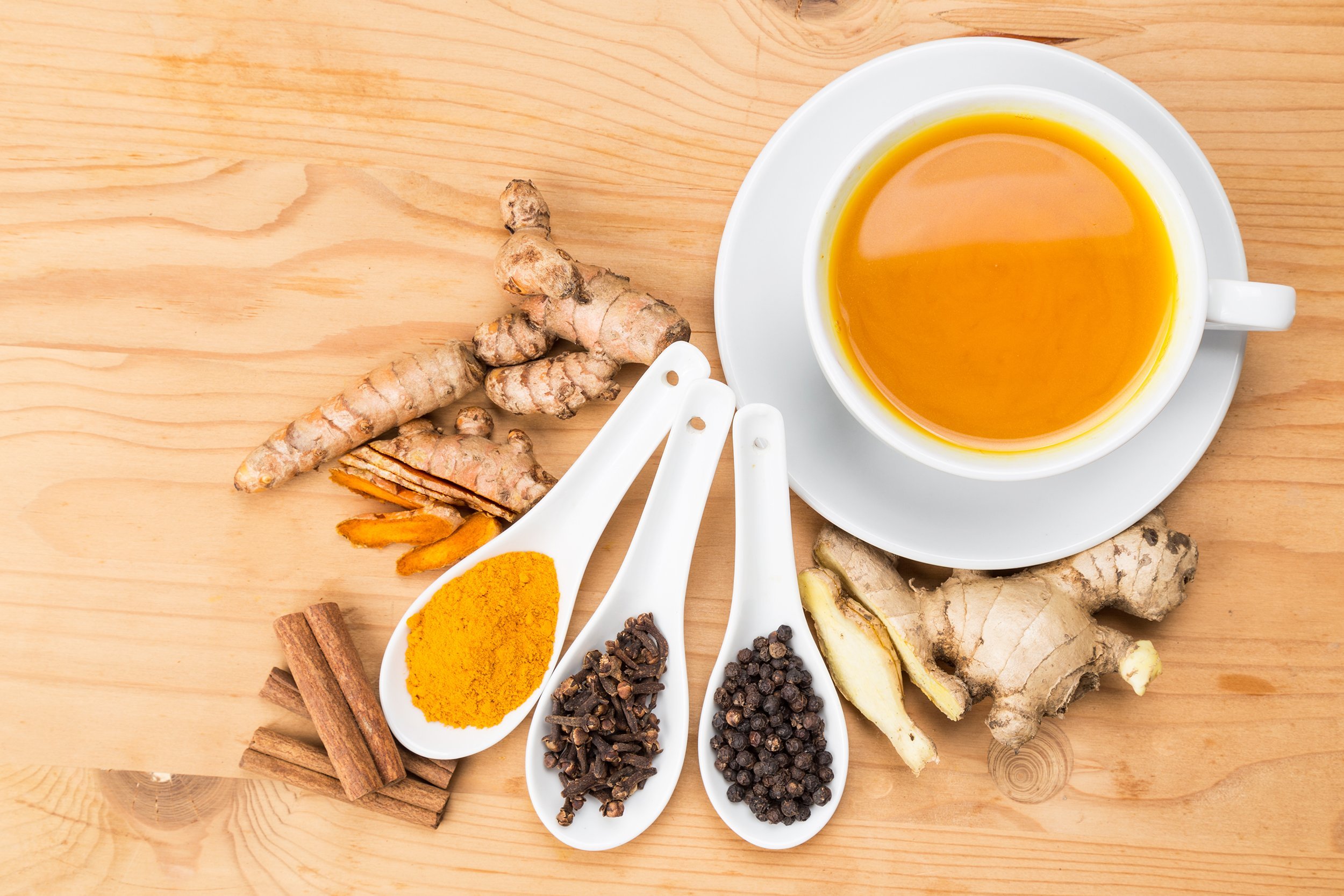 turmeric tea with black pepper, cinnamon, cloves and ginger