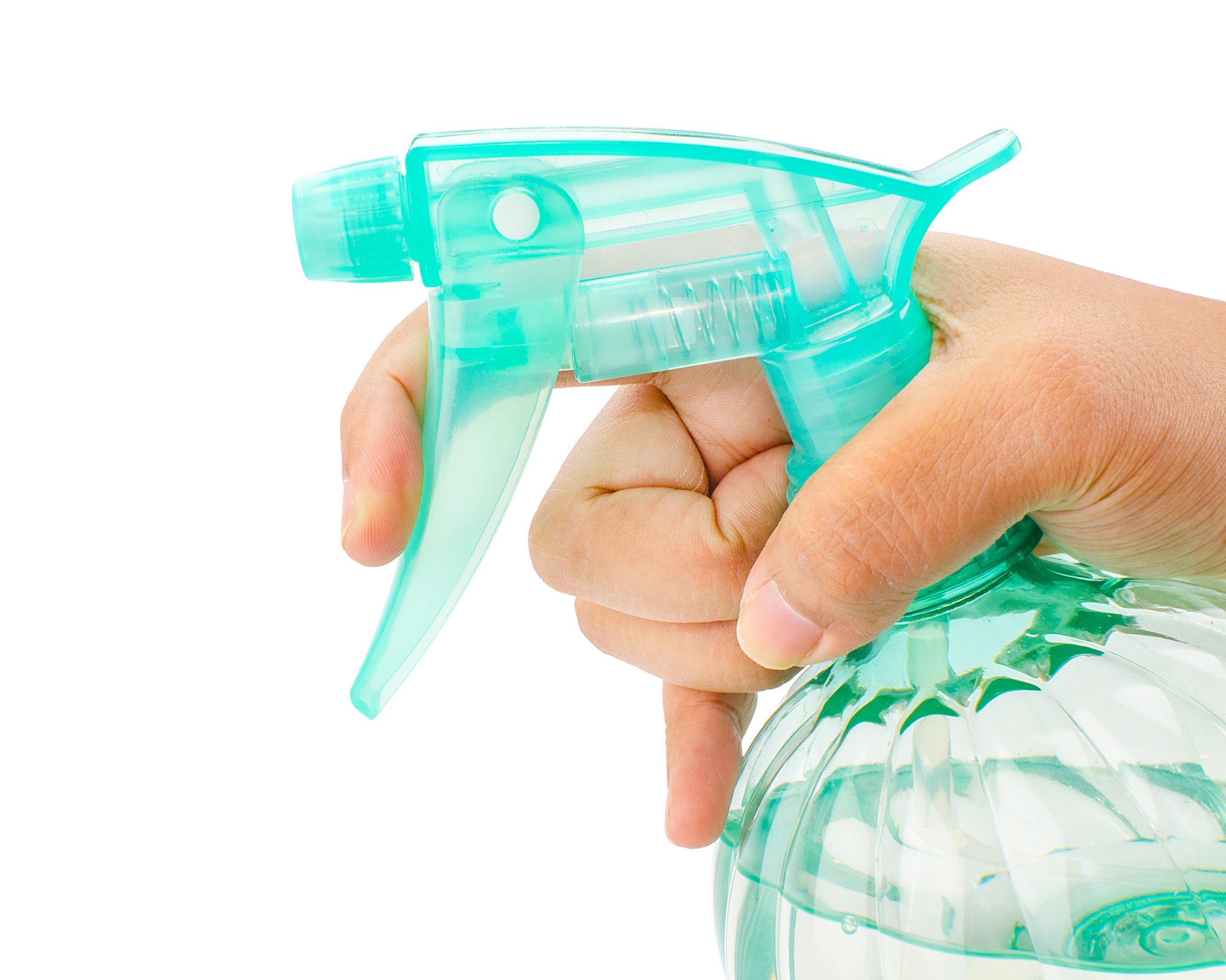 female hand with sprayer on spray bottle