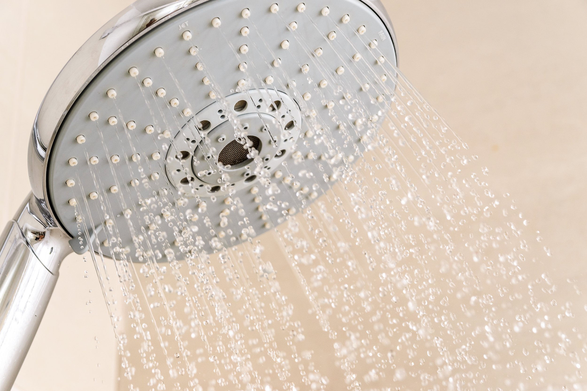 shower head spraying water