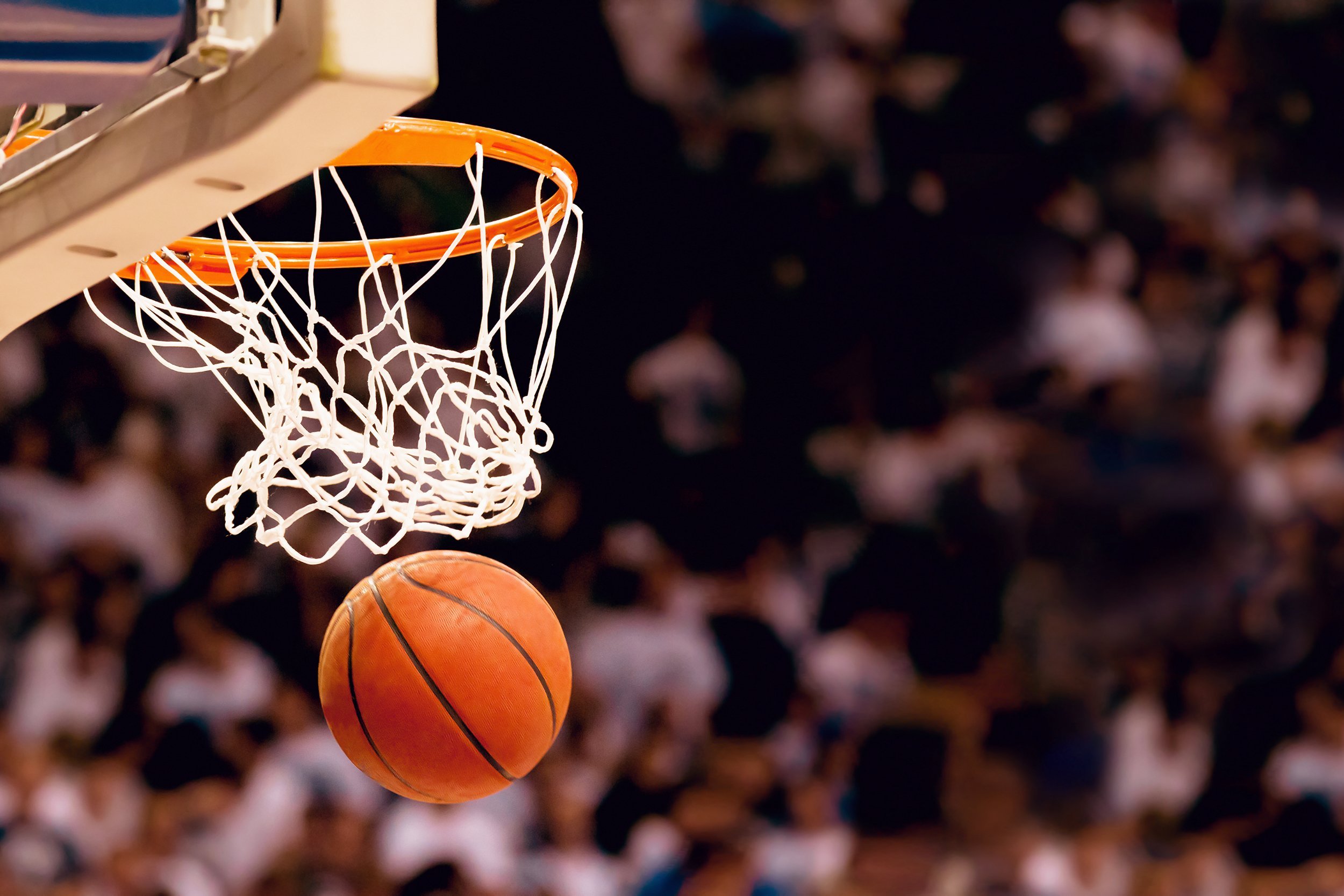 scoring the winning points at a basketball game