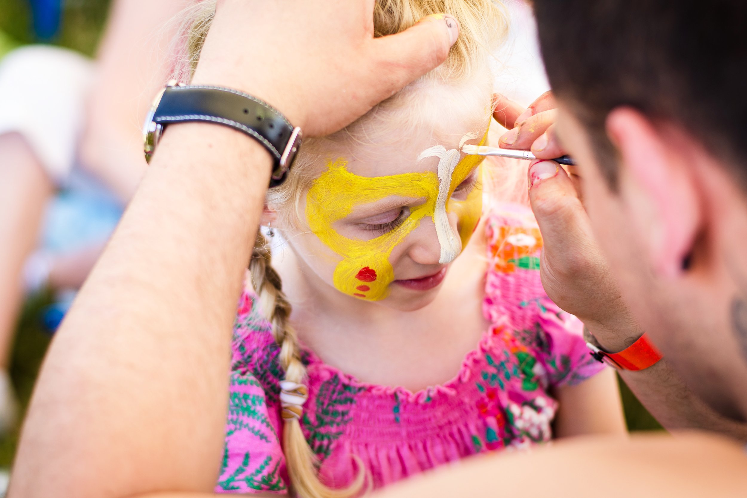 blond girl with face-painting
