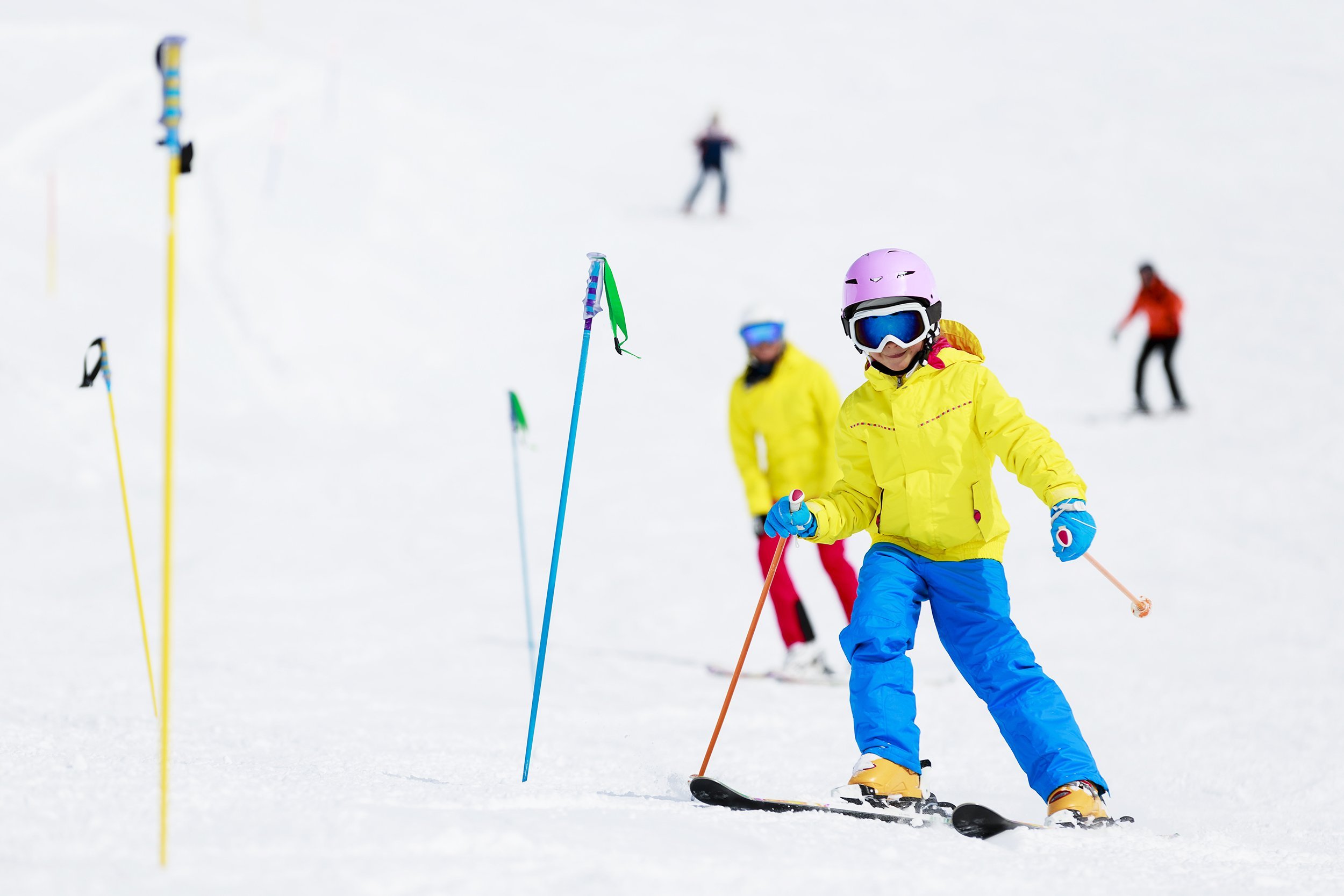 young skiers on ski run