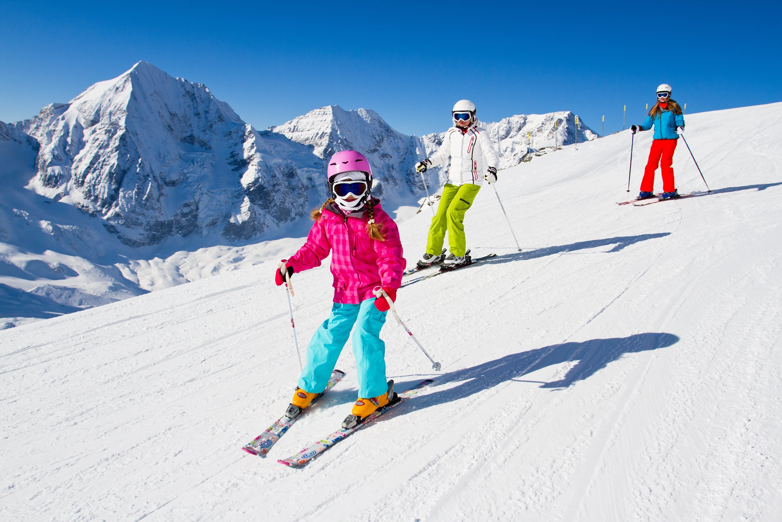 skiers on mountainside