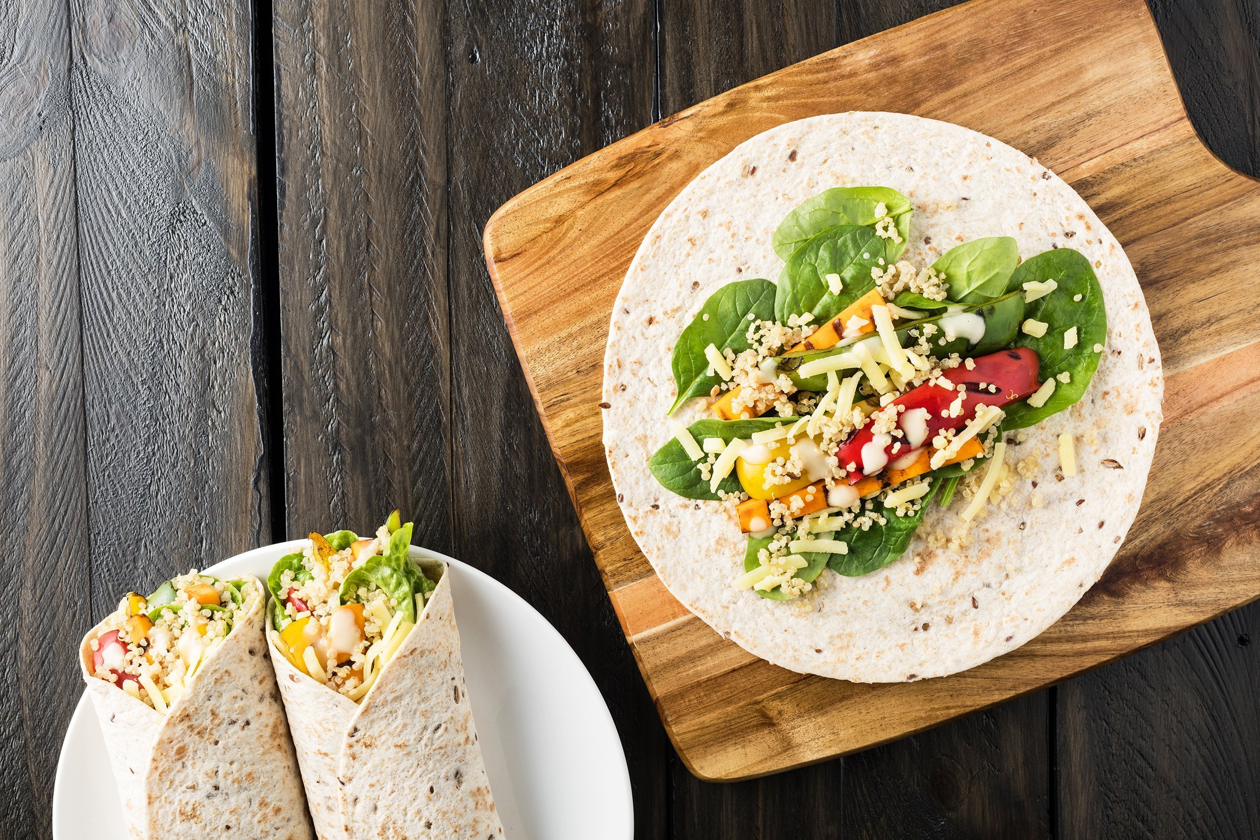 grilled vegetables wraps with quinoa, pumpkin, peppers and cheese
