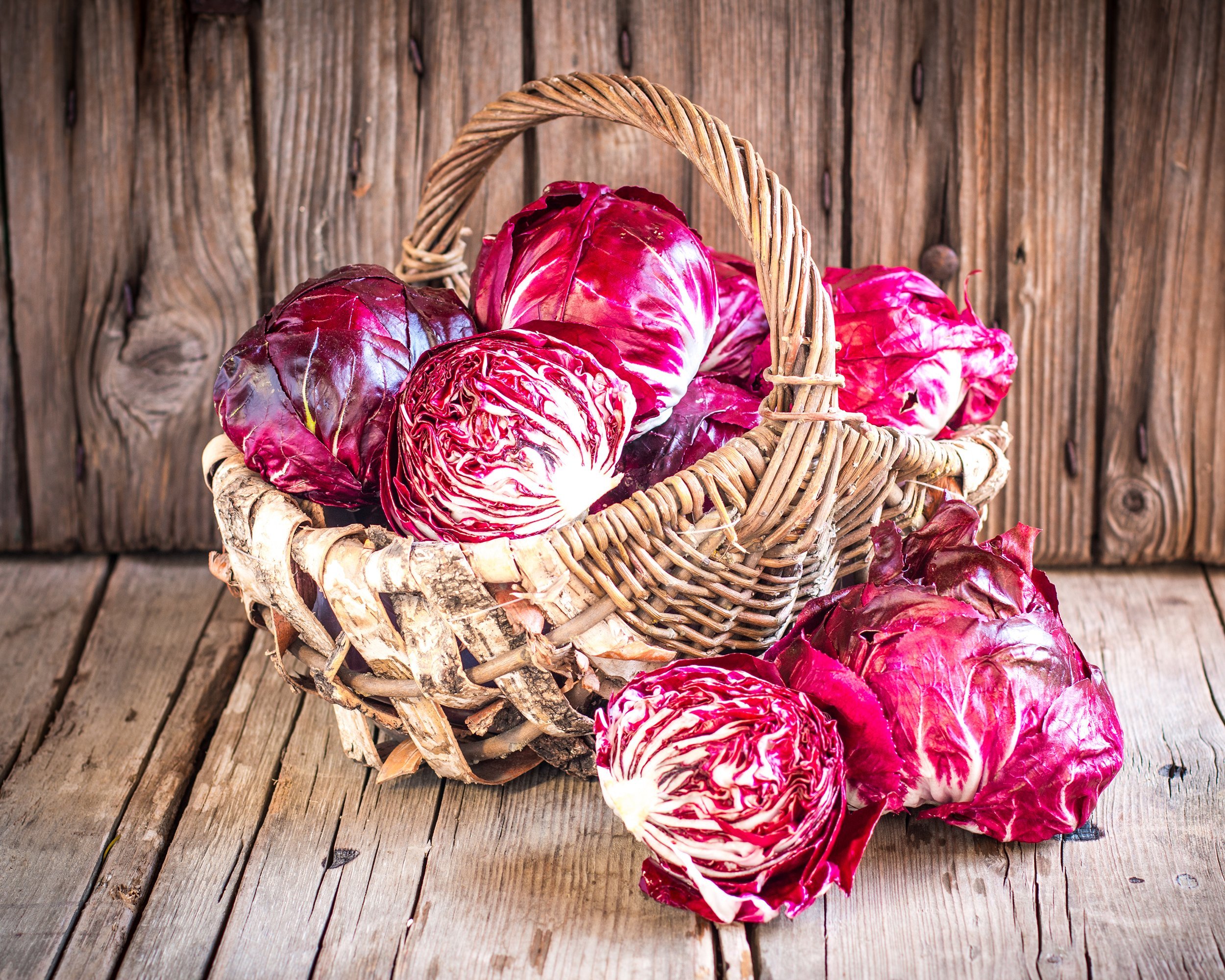 red radicchios on the wooden background