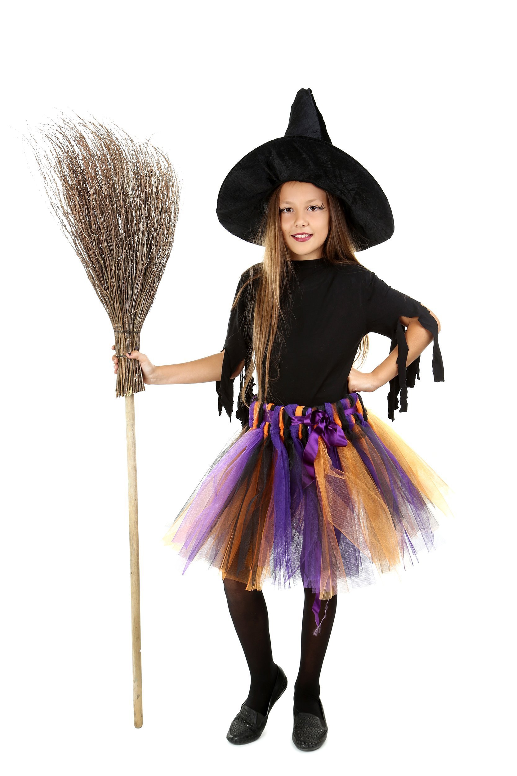 girl in a witch costume