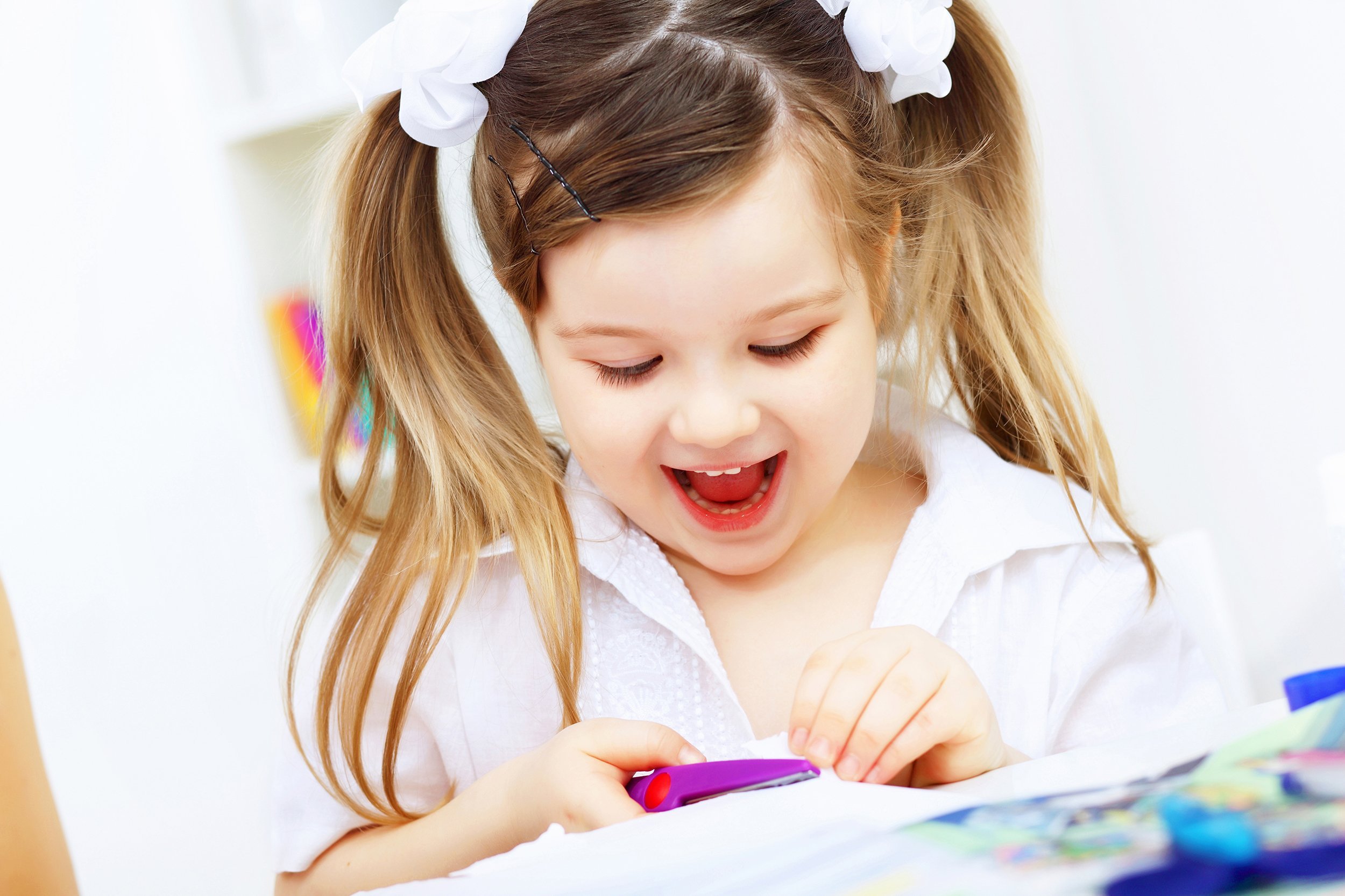 little girl crafting at home