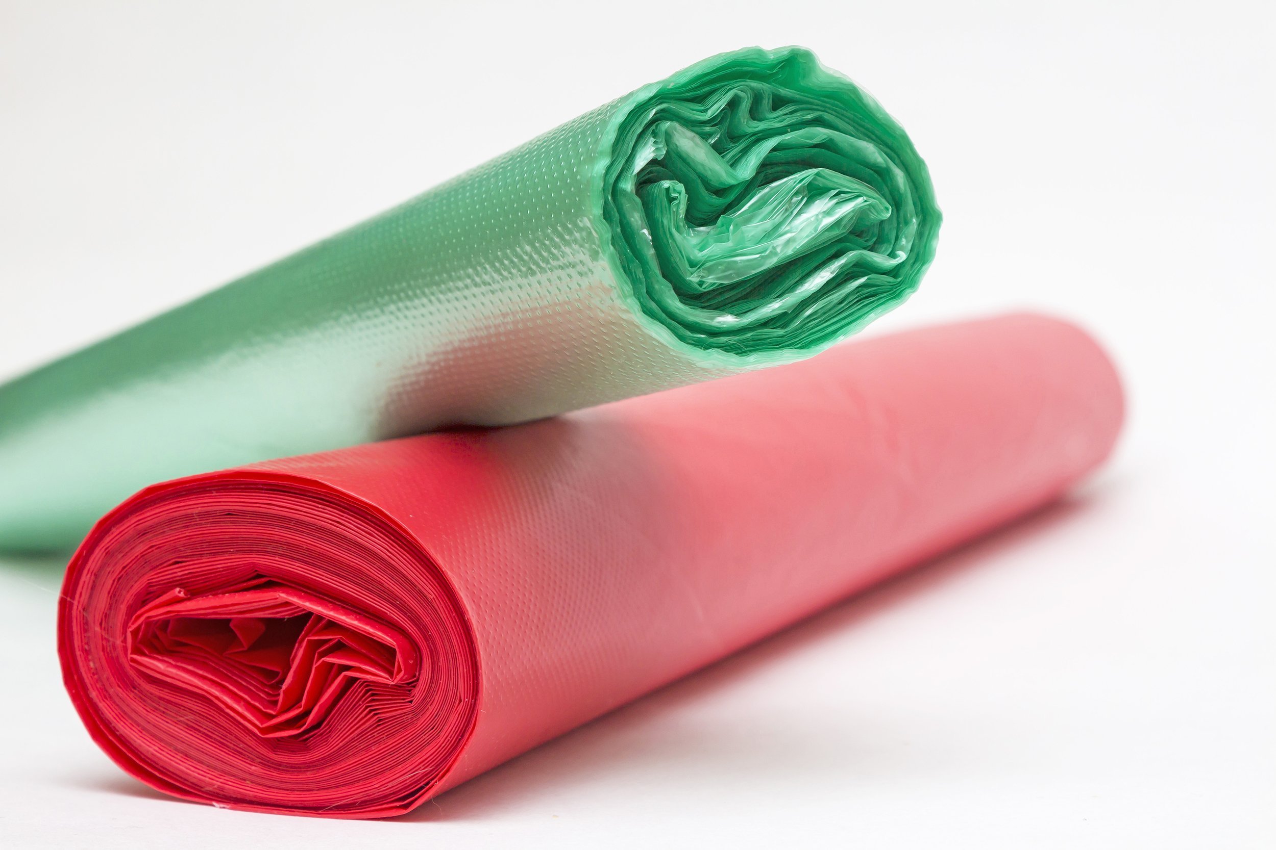 two rolls of red and green cellophane