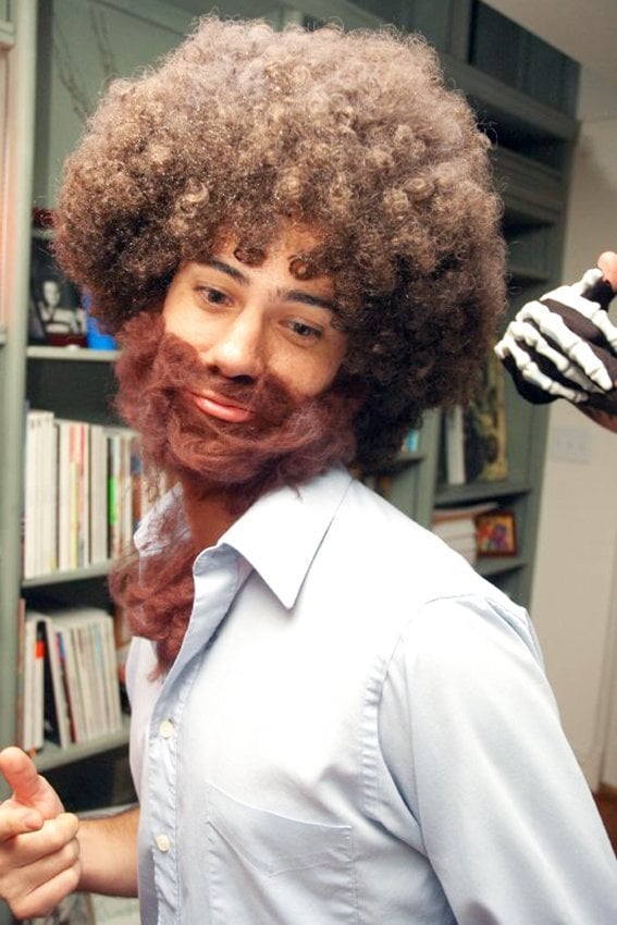 young man in Bob Ross costume