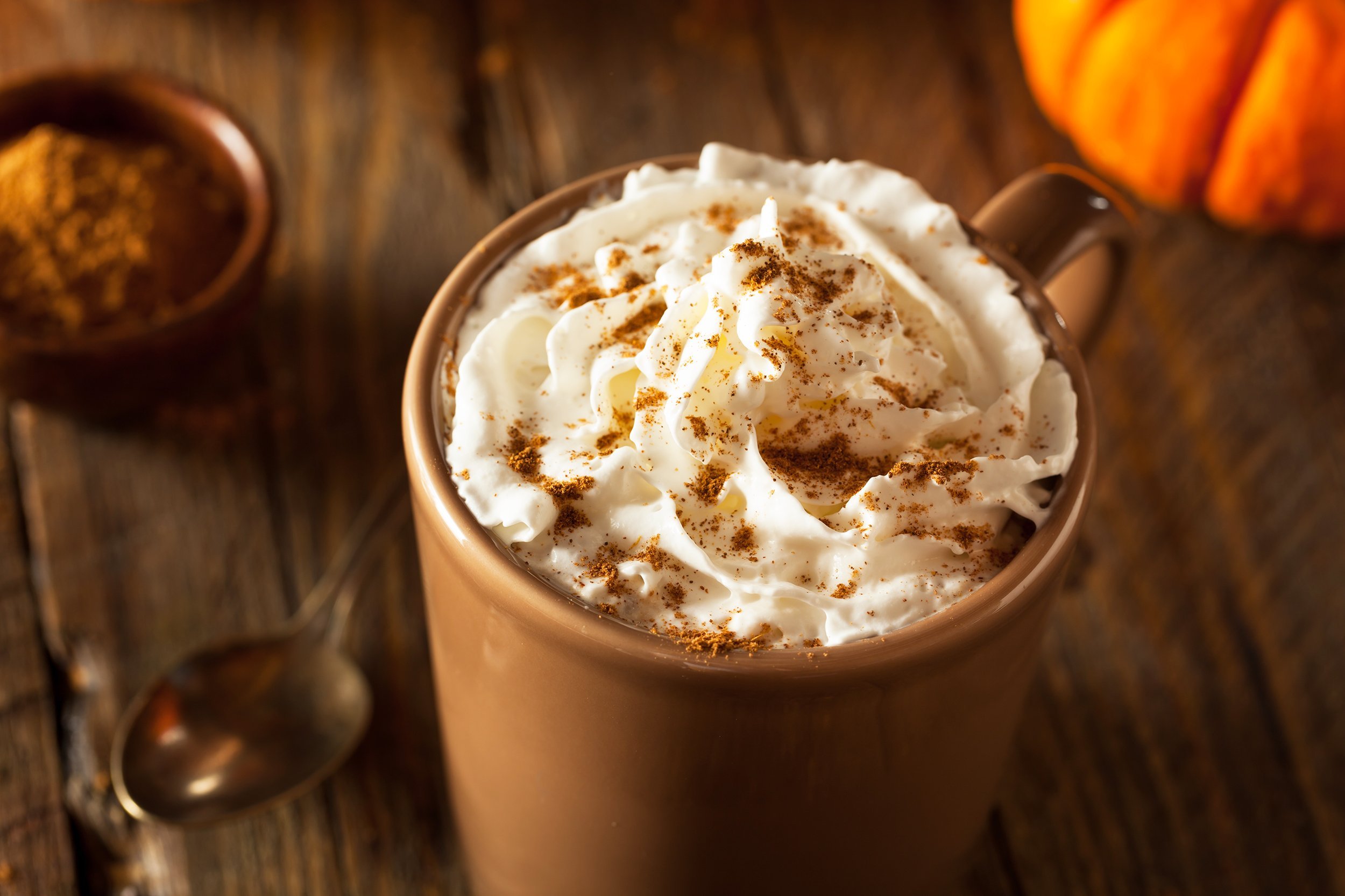 homemade pumpkin spice latte with whipped cream and cinnamon