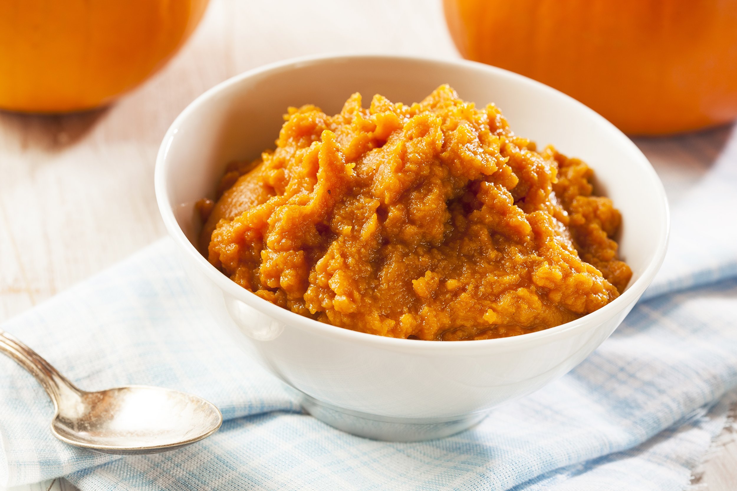 white bowl of pumpkin puree