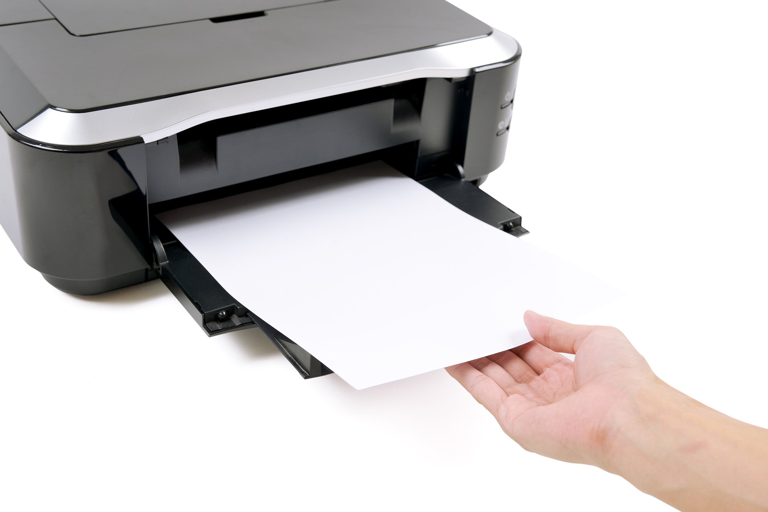 hand receiving paper from printer