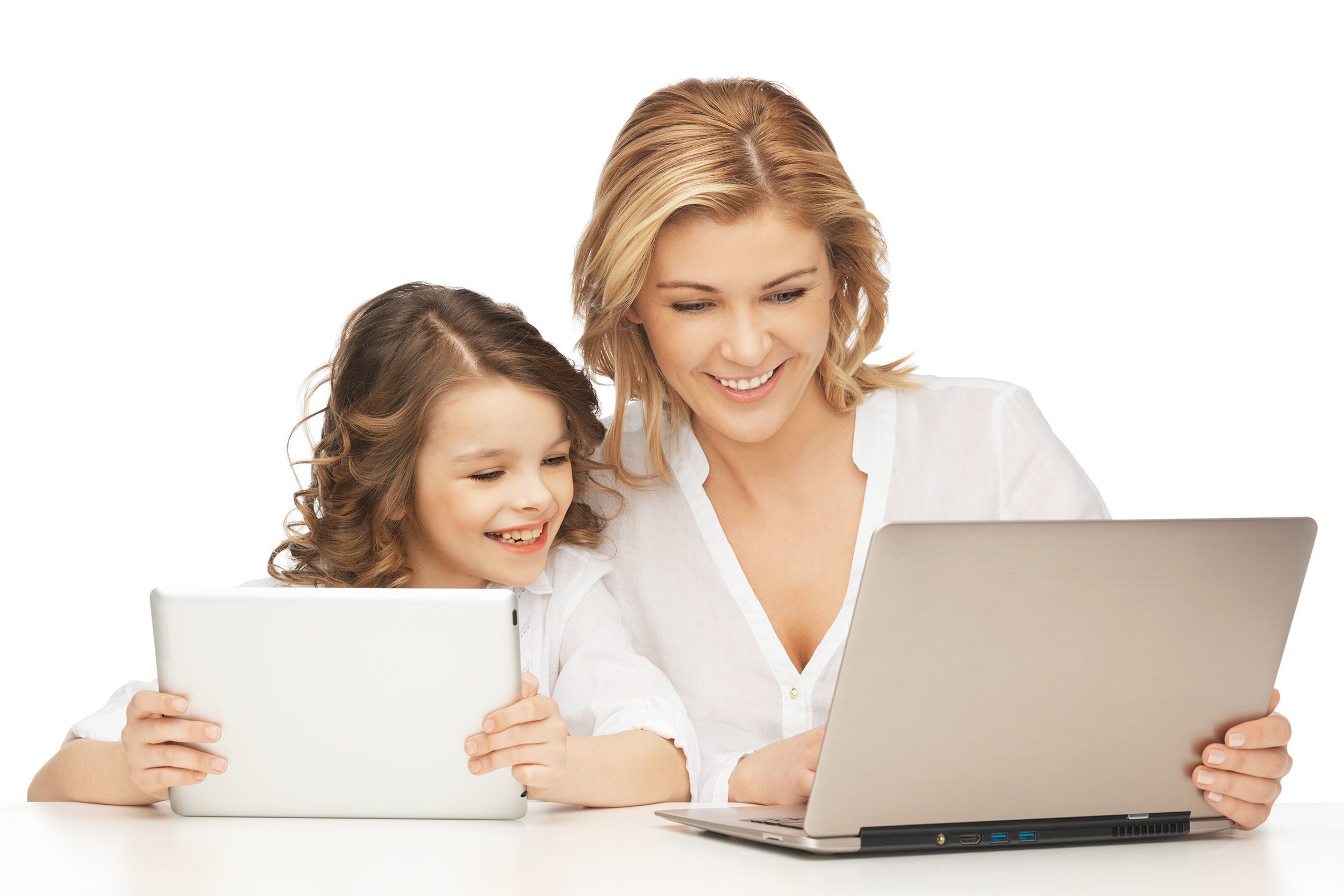 mother and daughter with laptop and tablet