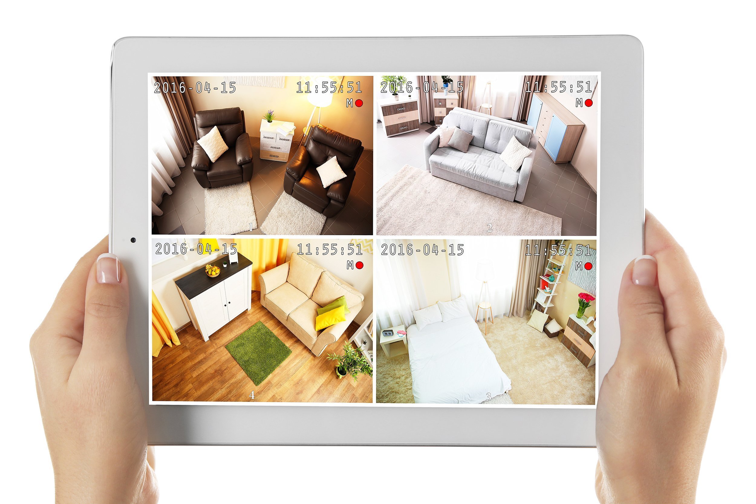 tablet in hands with home security system