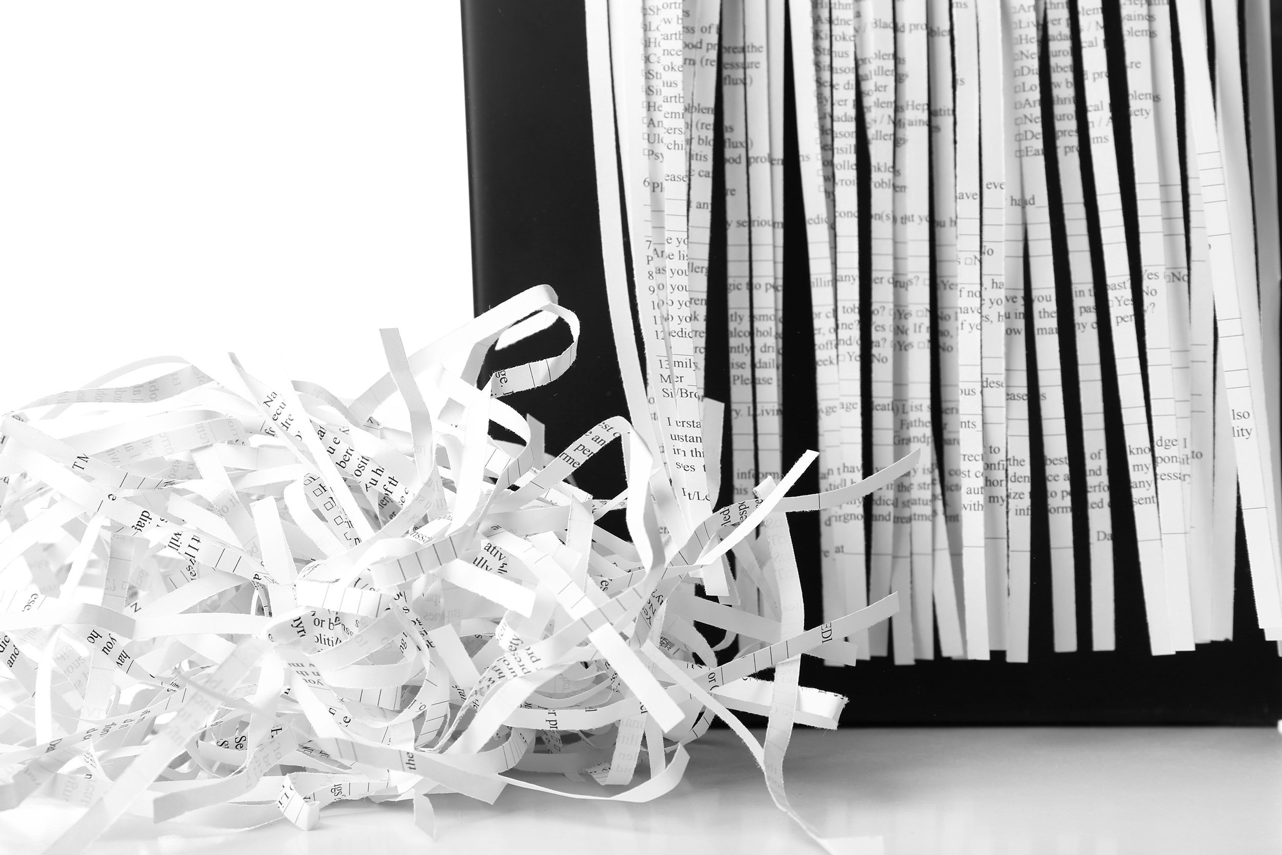 strips of destroyed paper from shredder