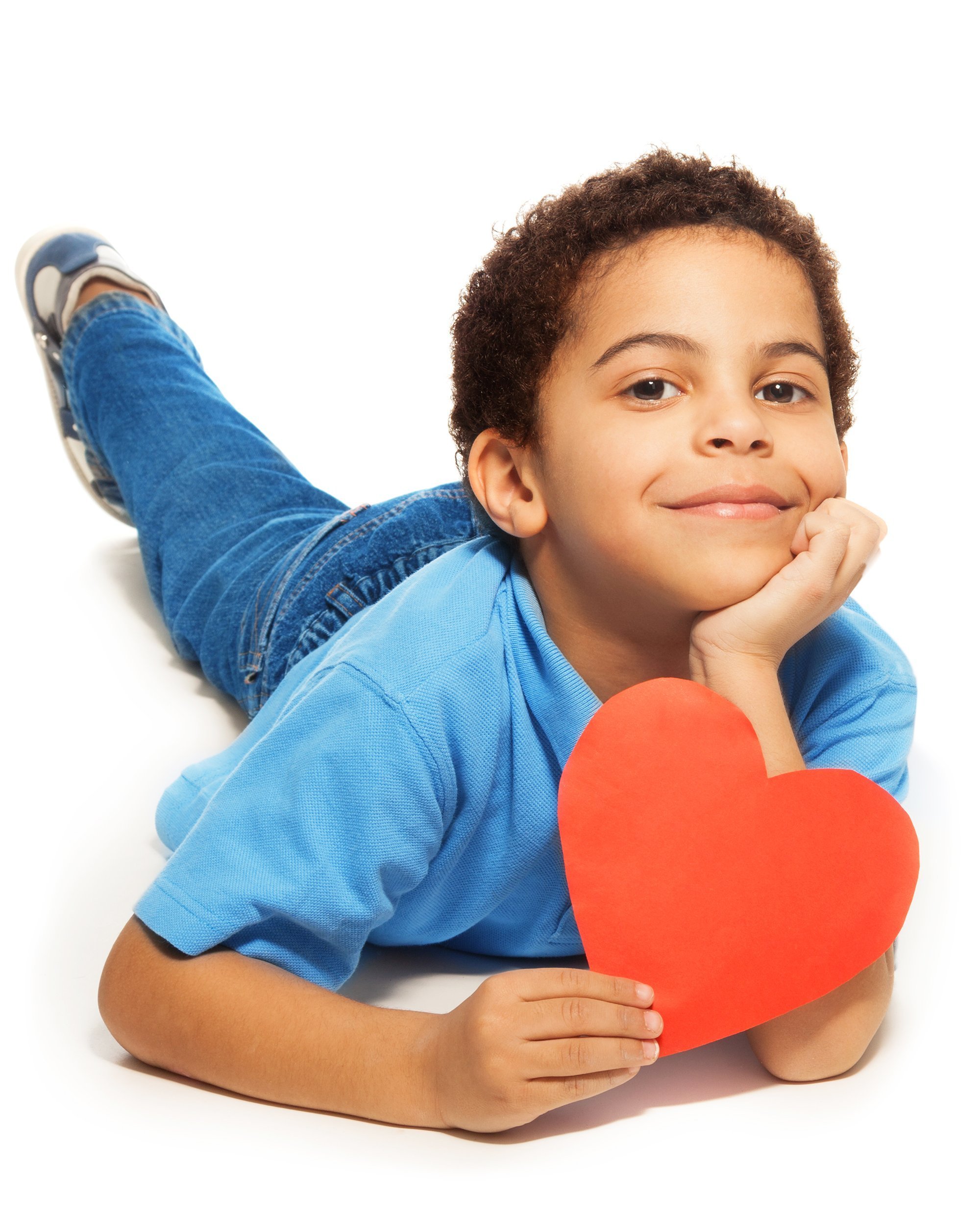 cute five years old boy with heart cut-out