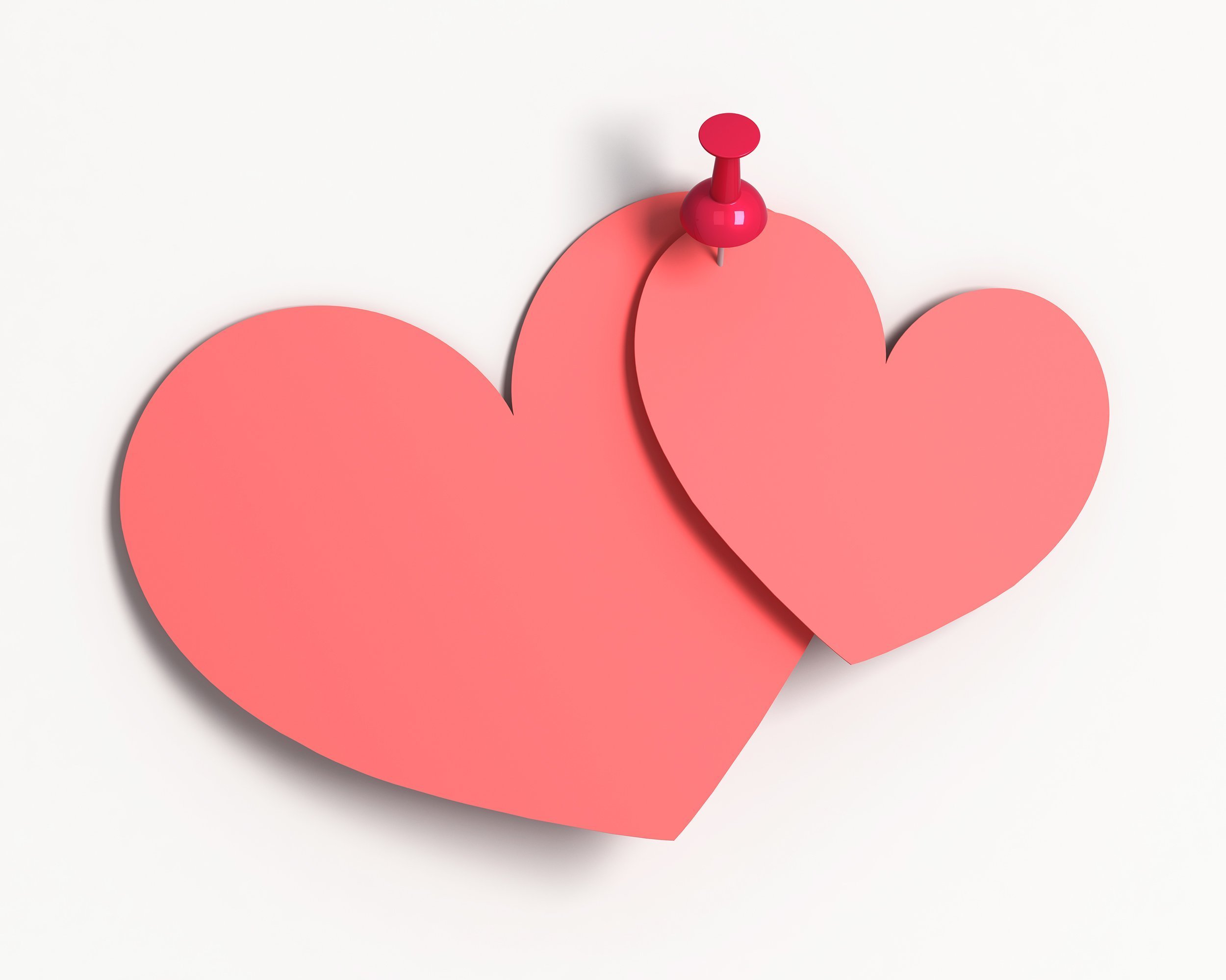paper heart pinned to the wall