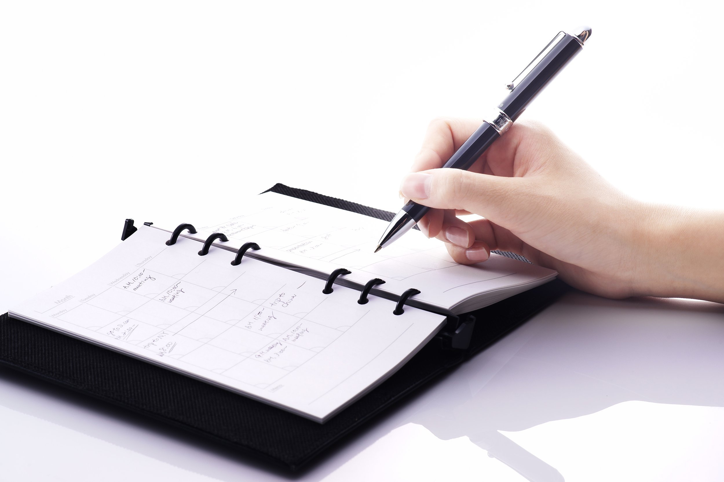 hand writing in day planner