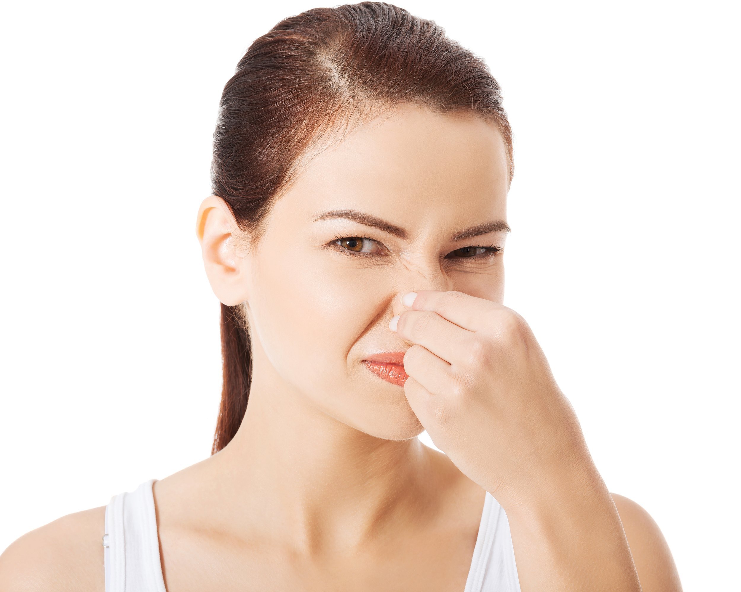 woman holding her nose because of a bad smell