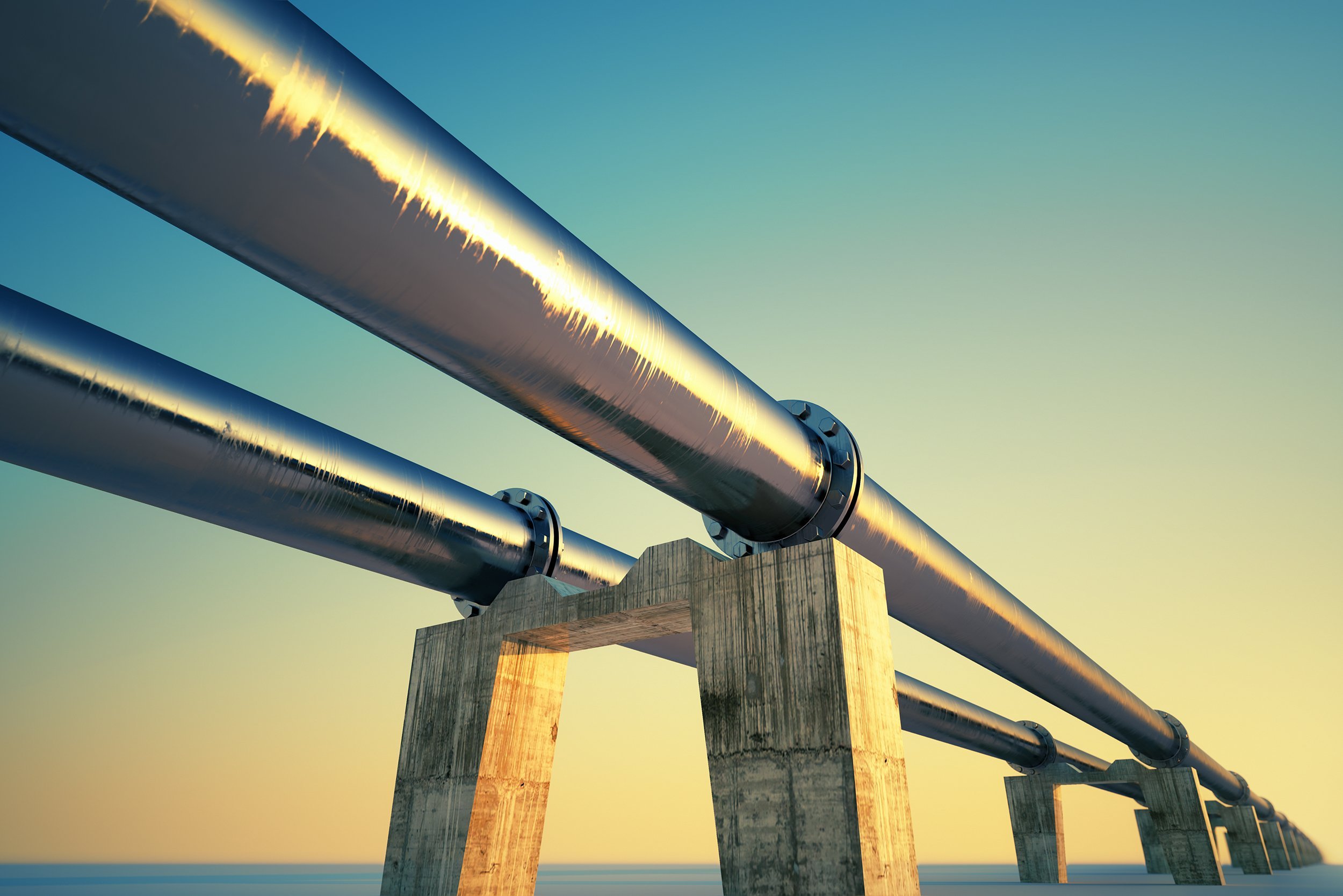 bottom shot of a pipeline at sunset