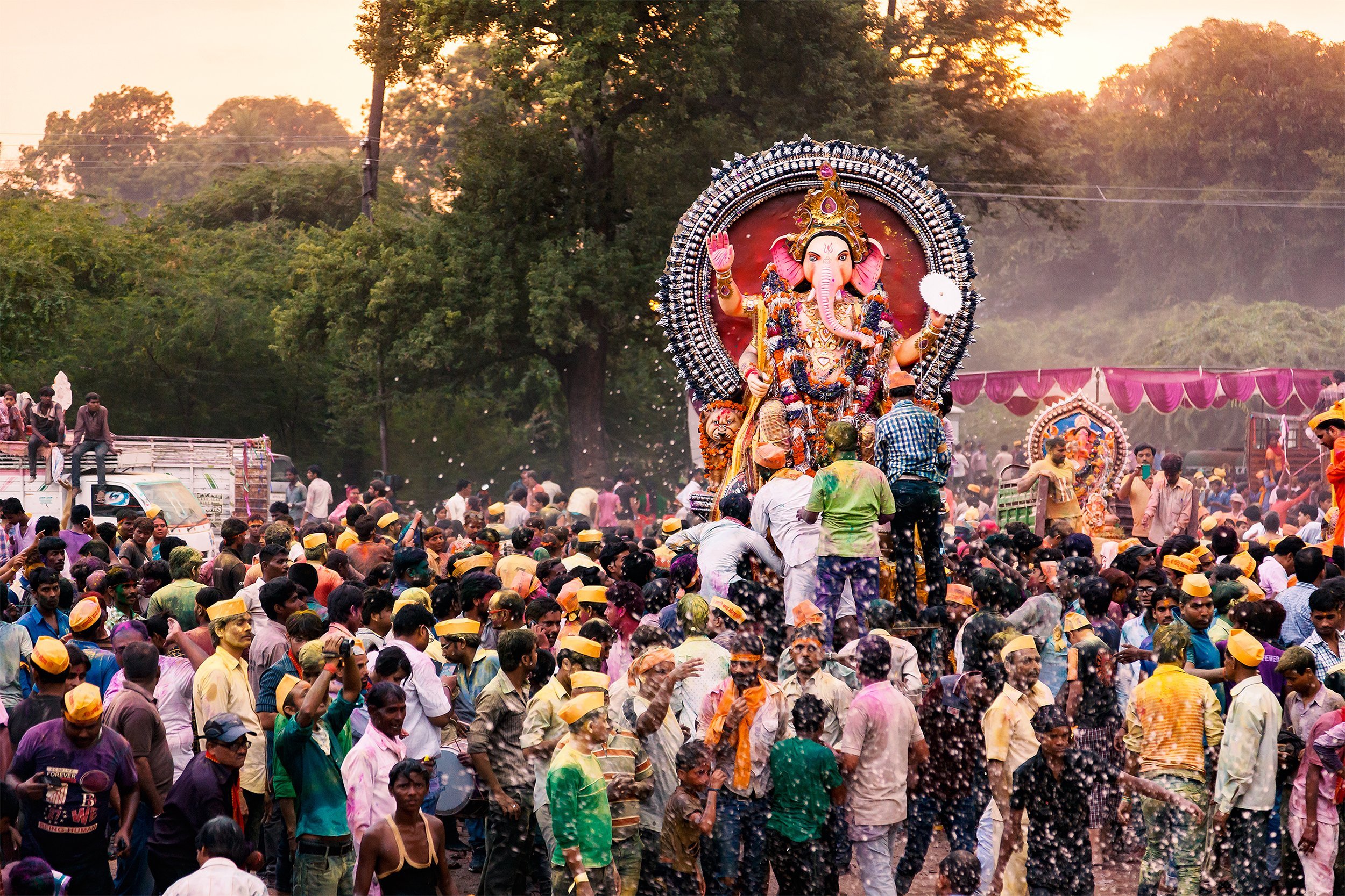 people carrying Hindu God Idol Ganesh for Ganpati Visharjan at the Ganges River