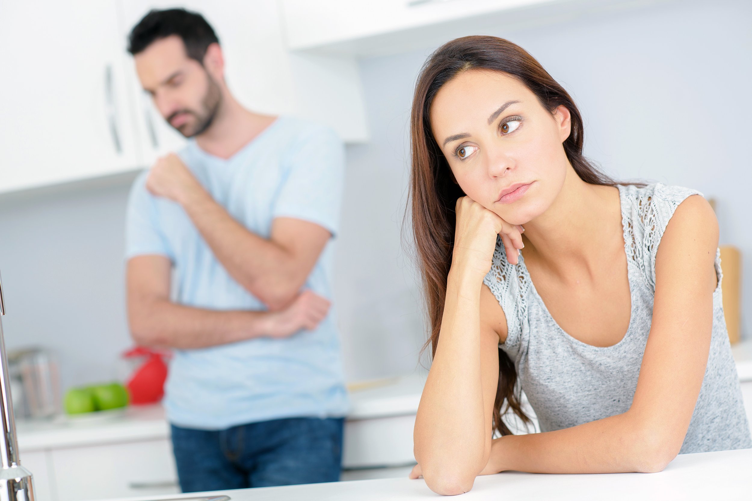 couple having an argument in the kitchen