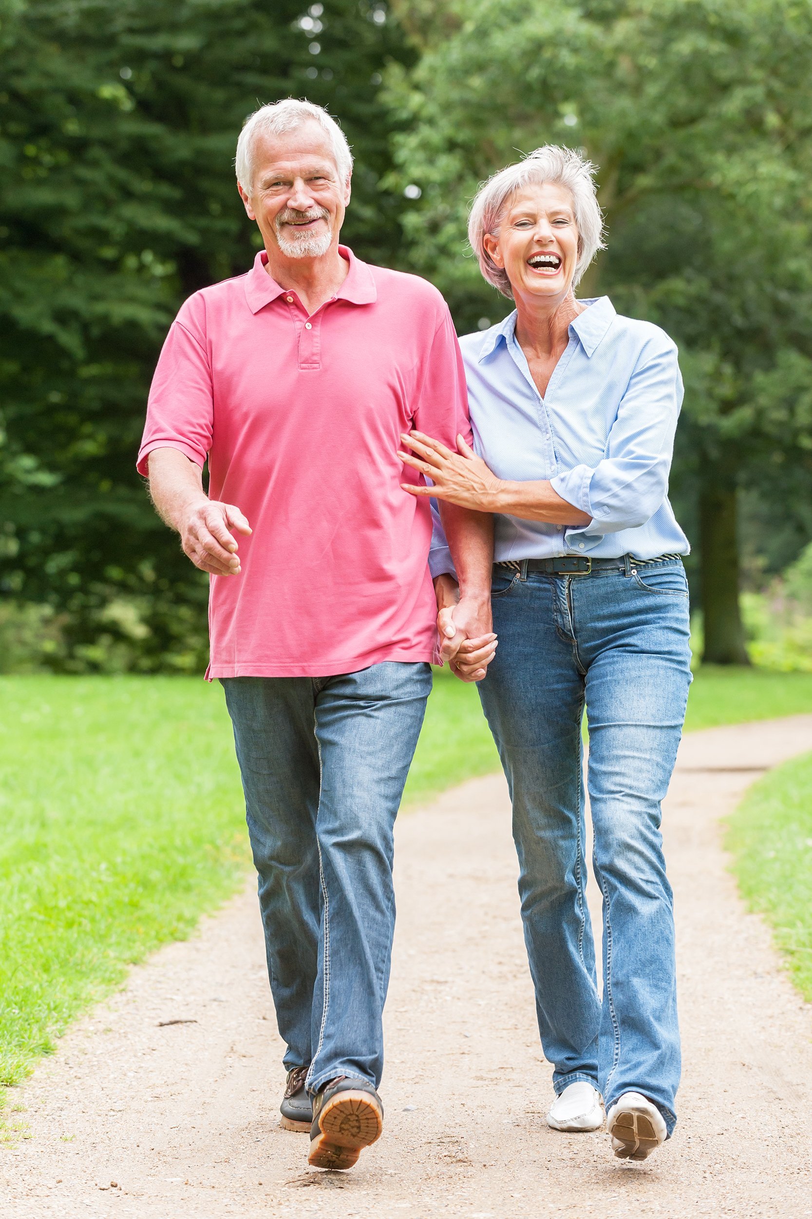 senior couple walking outside