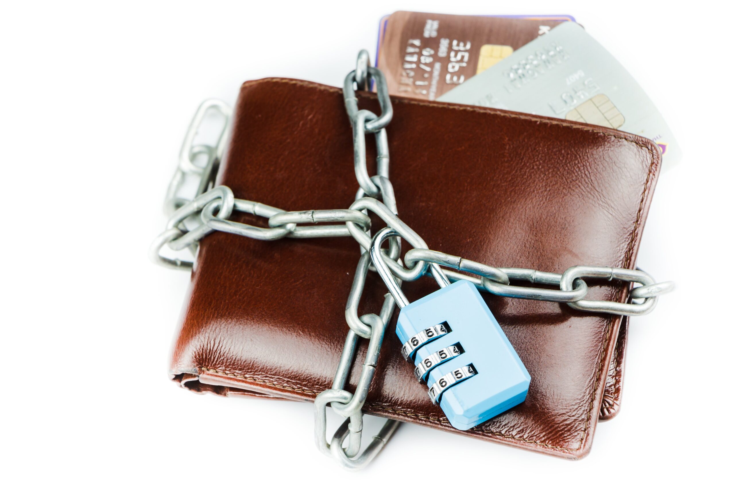 wallet with credit cards wrapped in chain with padlock