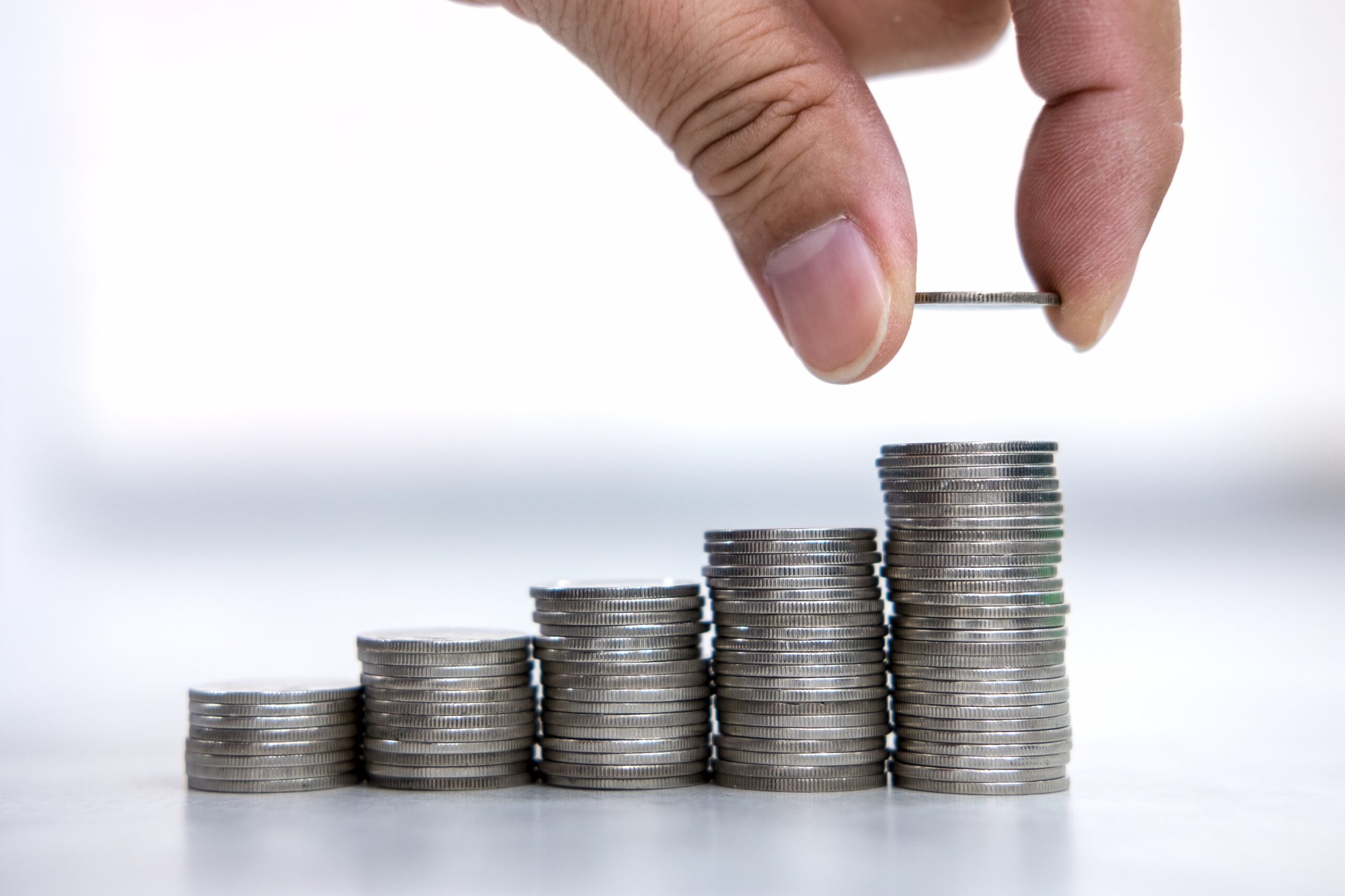 increasing stack of coins