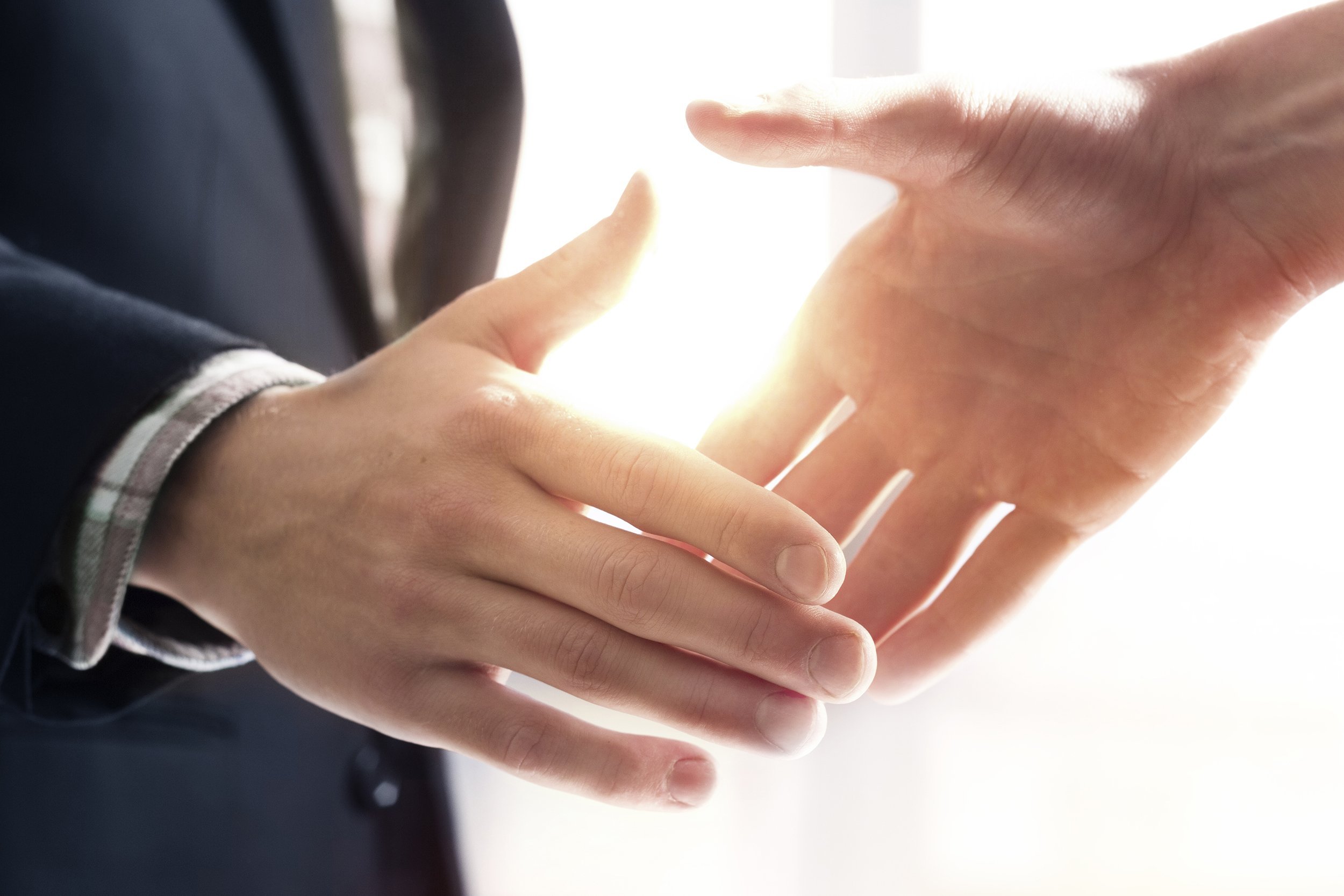 two male hands handshaking