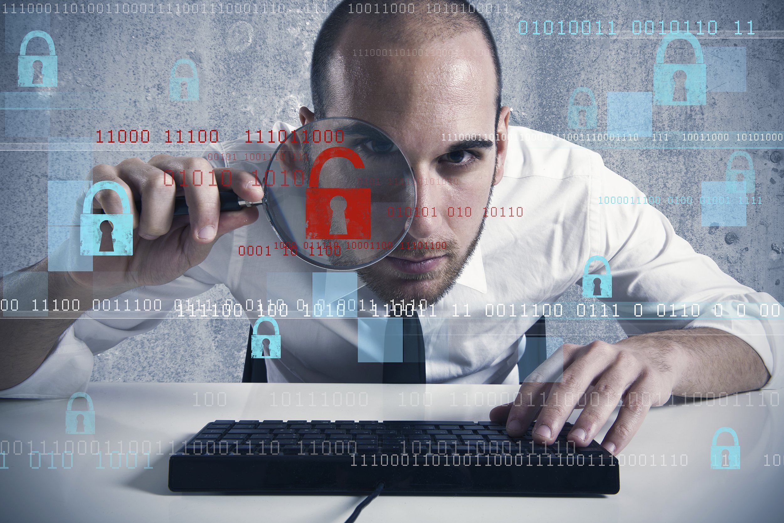 businessman looking in a computer for virus and hacker