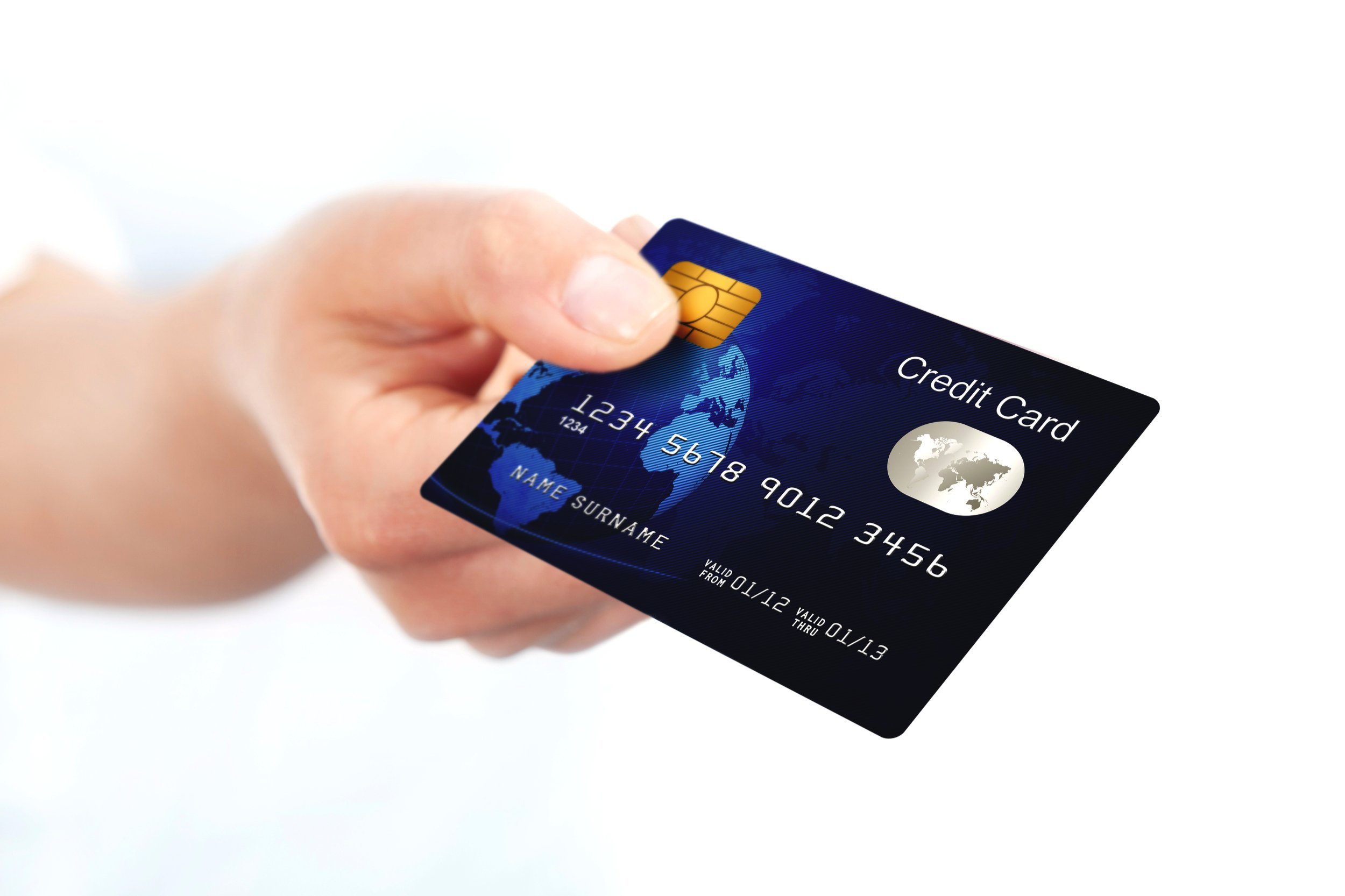 Closeup of hand holding a blue credit card