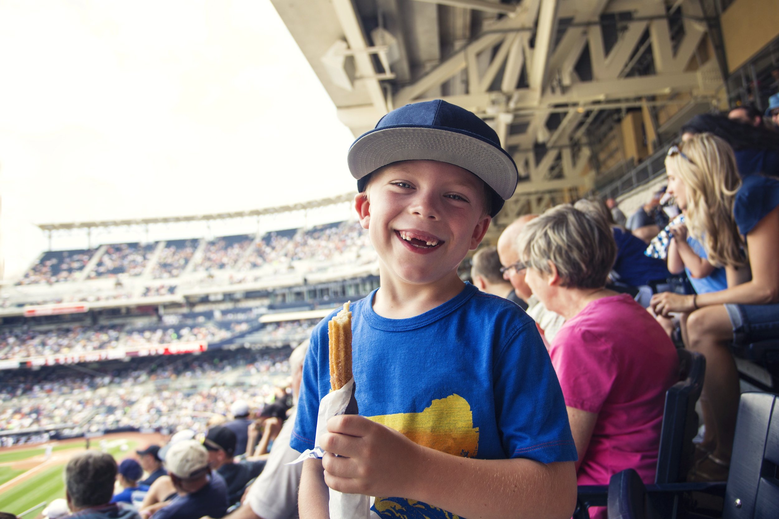 Young boy enjoying a professional baseball game