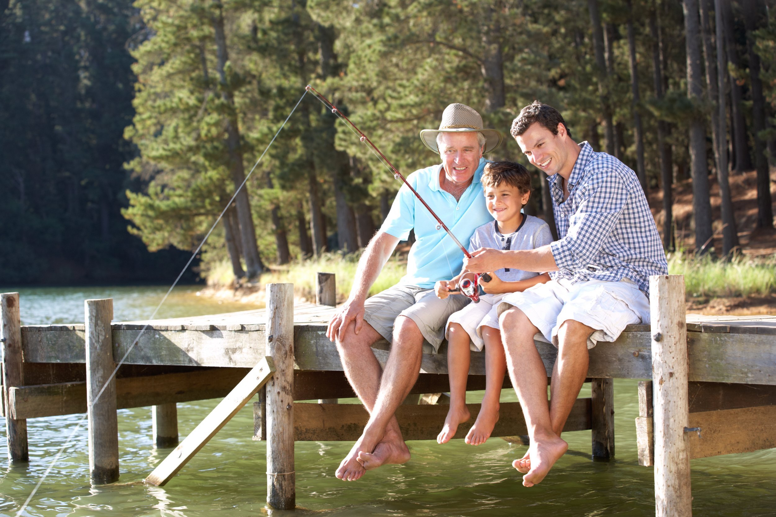 Father, son and grandson fishing together