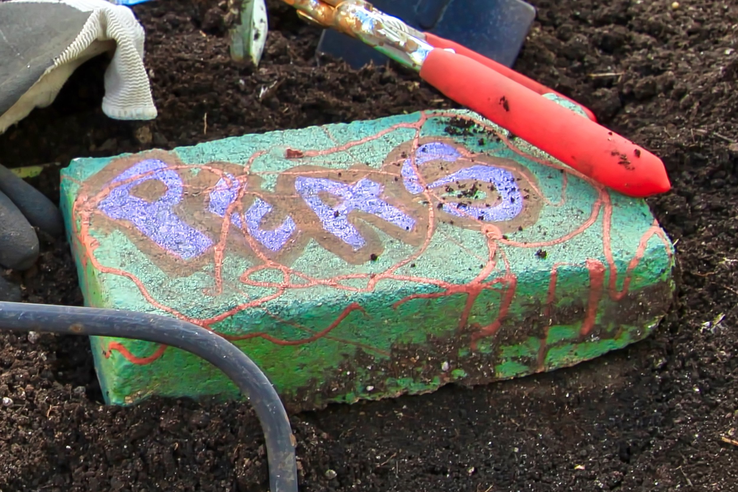 painted brick in garden