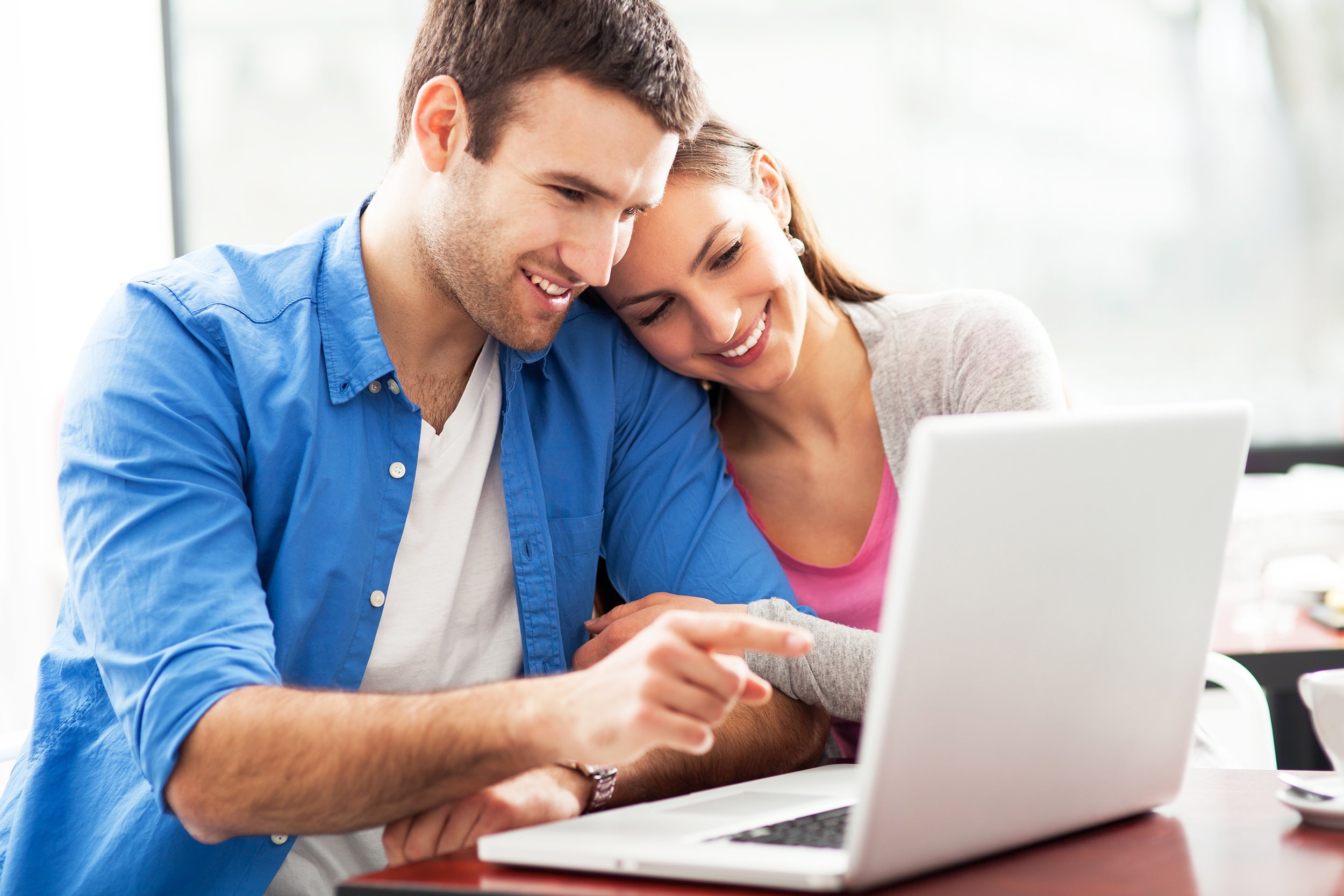 couple looking at laptop