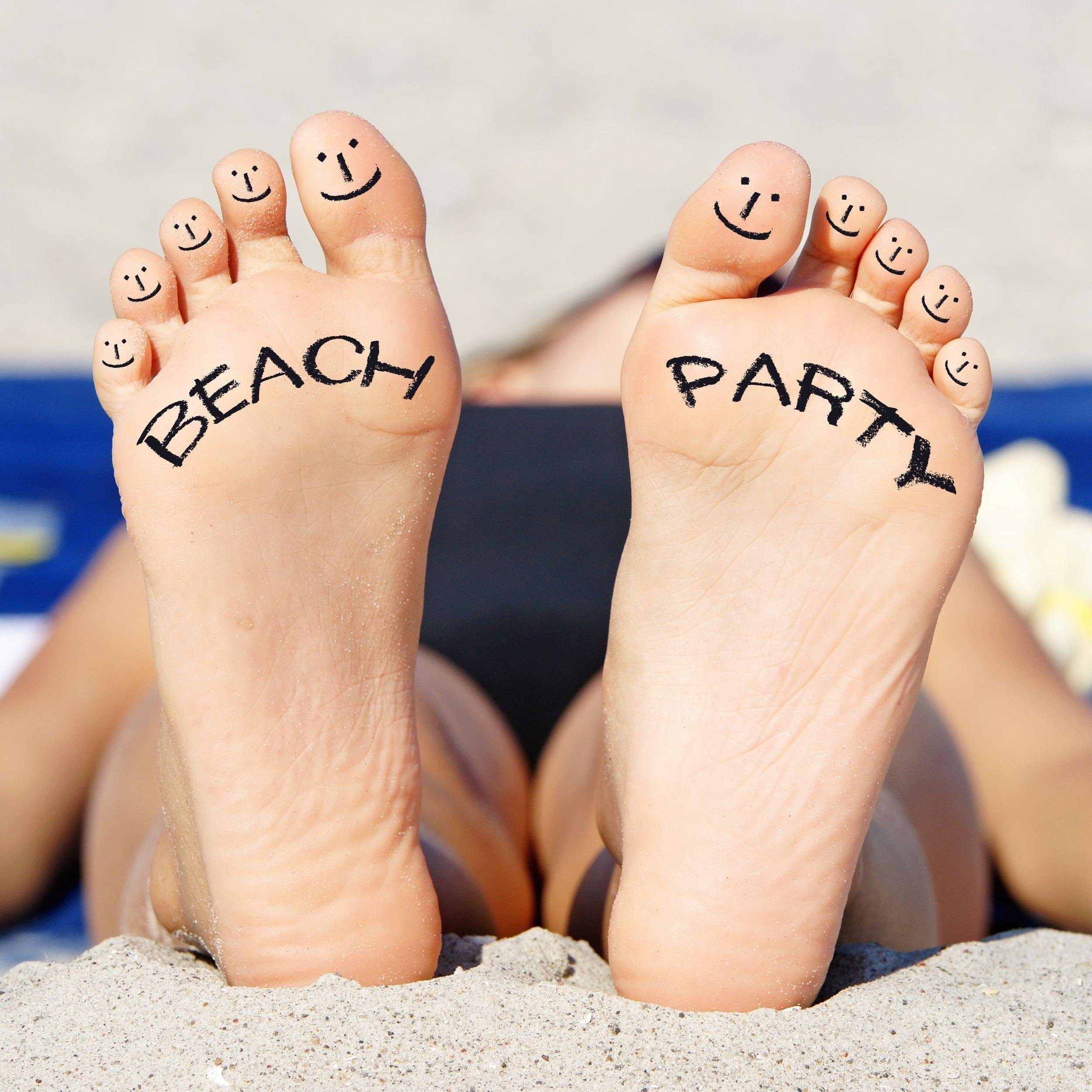 feet at a beach party
