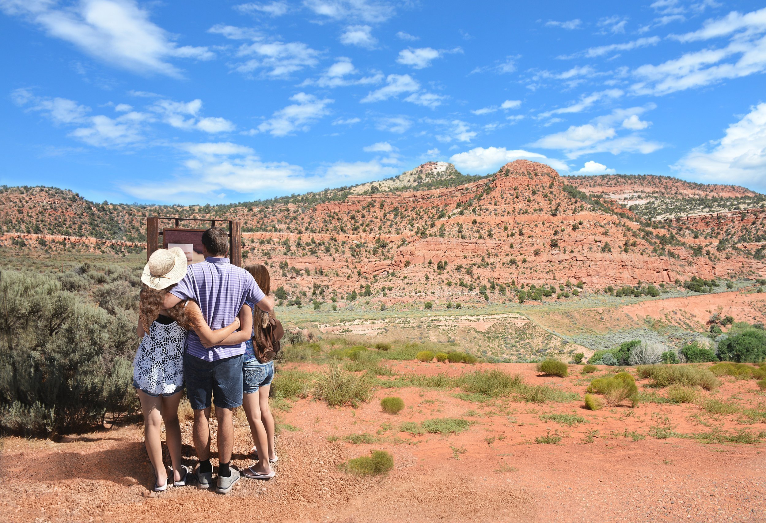 family hiking in the mountains on vacation in New Mexico, USA
