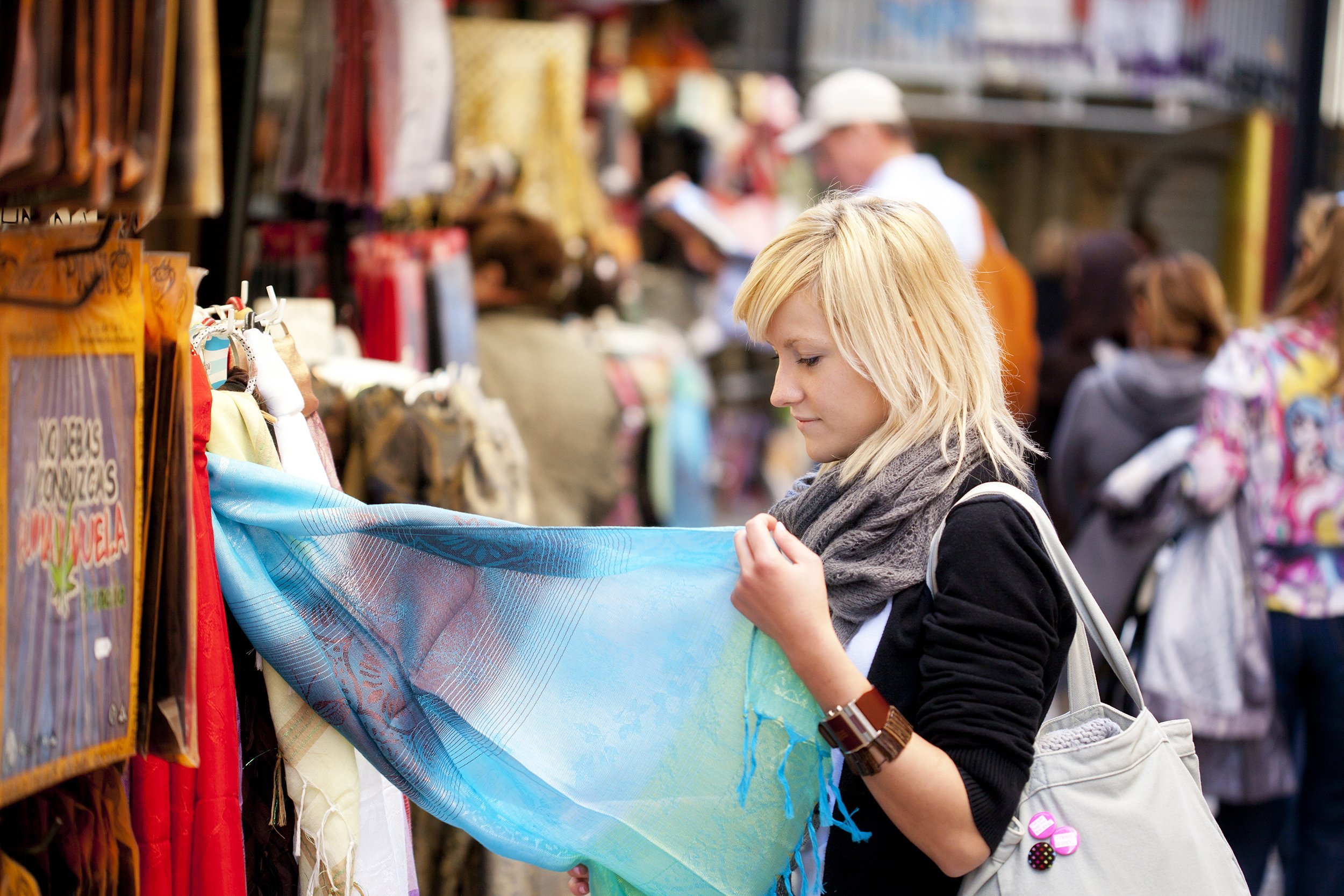 young woman shopping some muslim goods