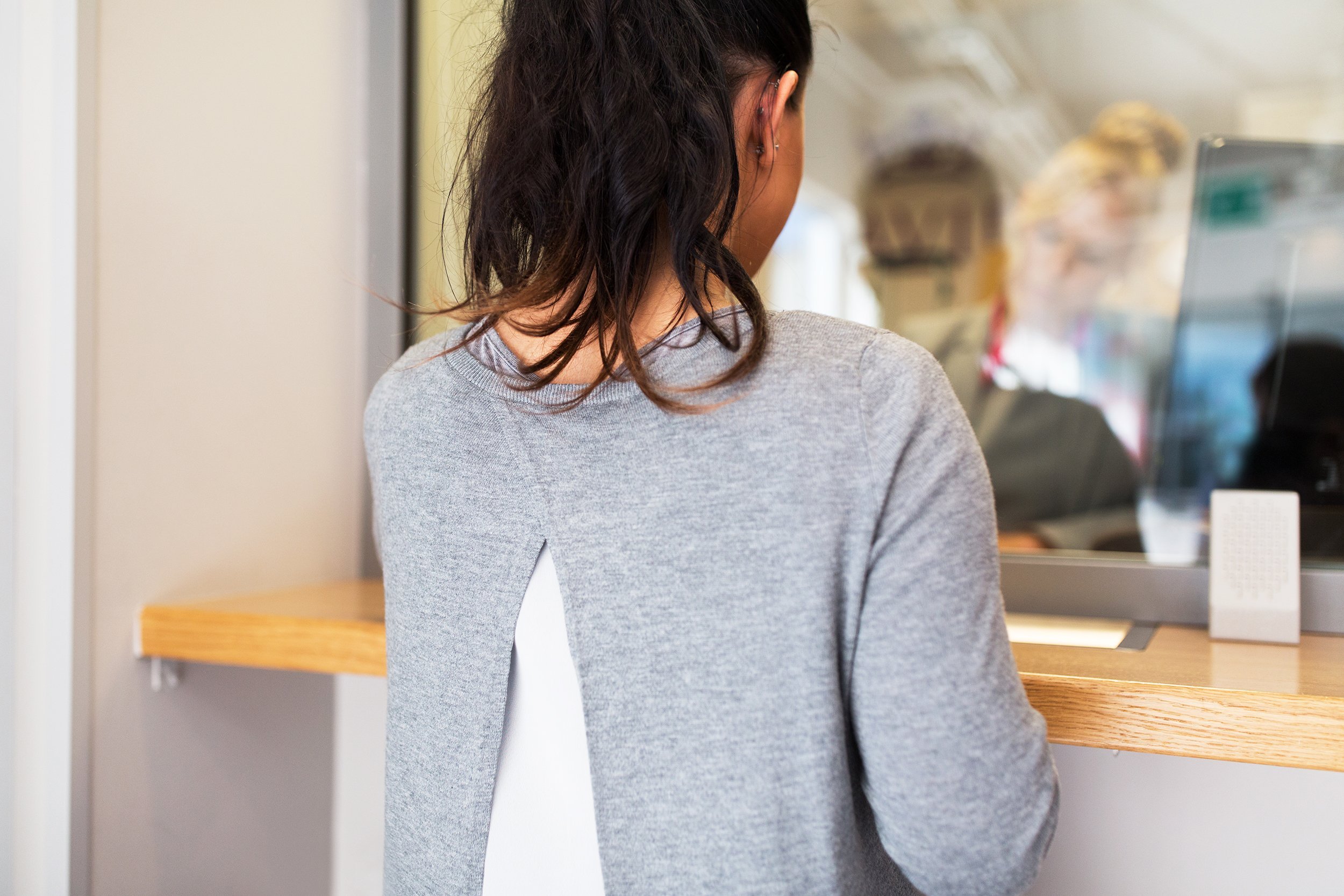 customer at bank office window