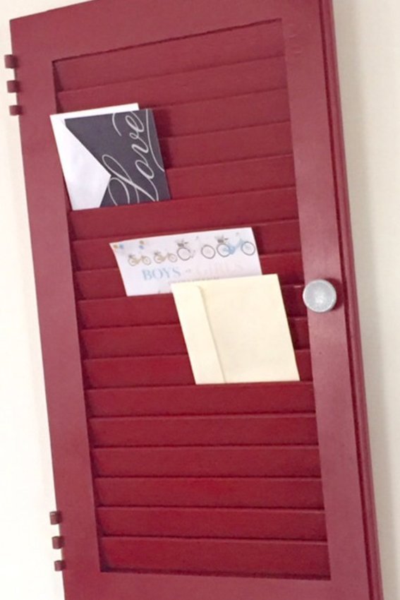 old shutter with papers in it