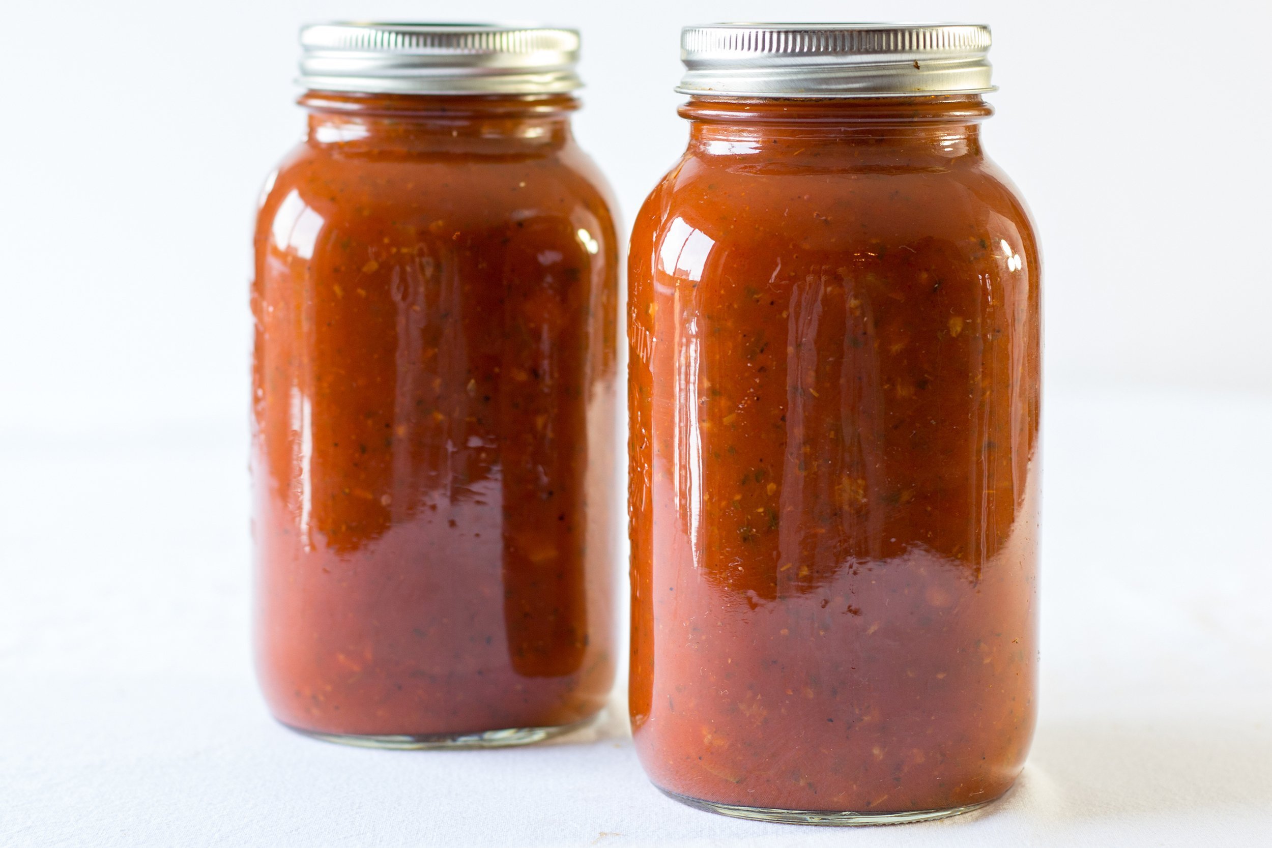 Two jars of spaghetti sauce