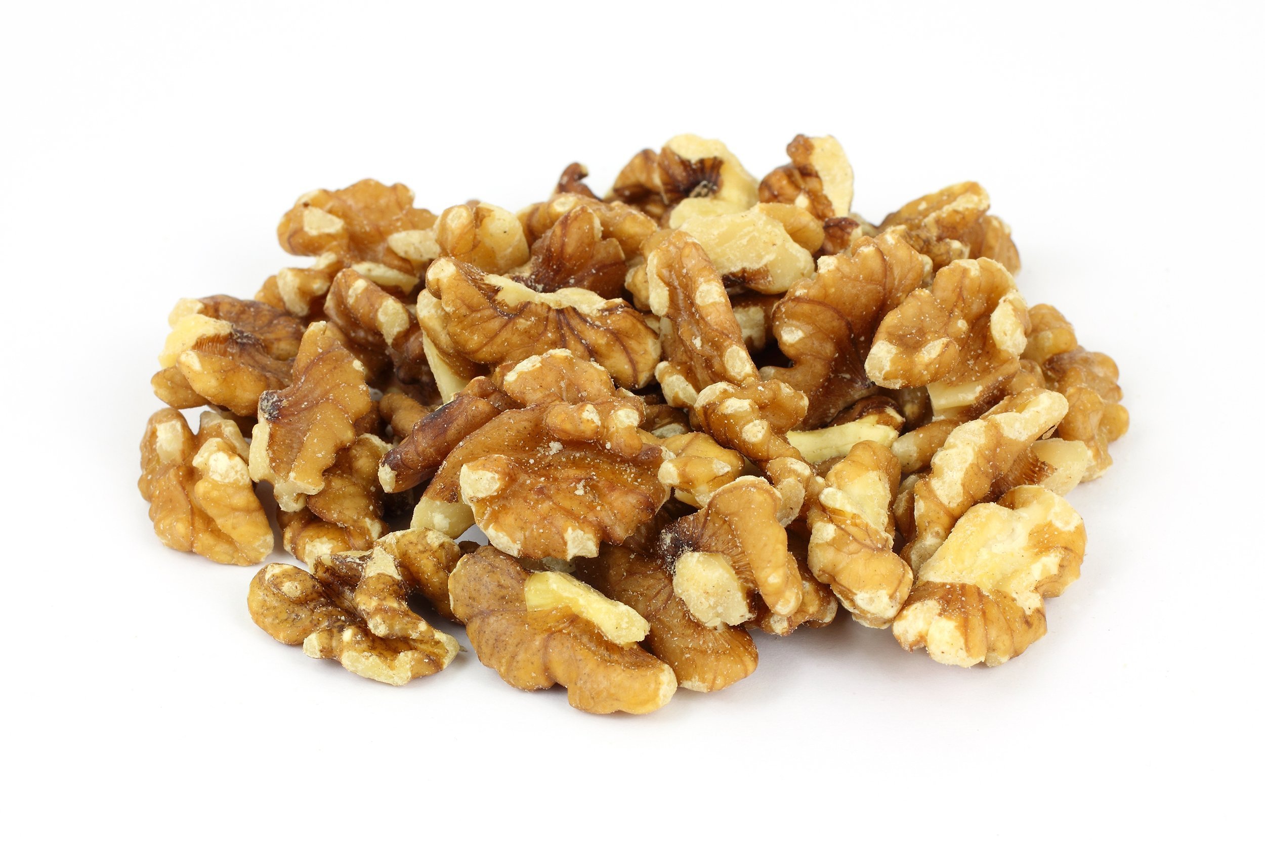 Stack of walnut pieces and halves