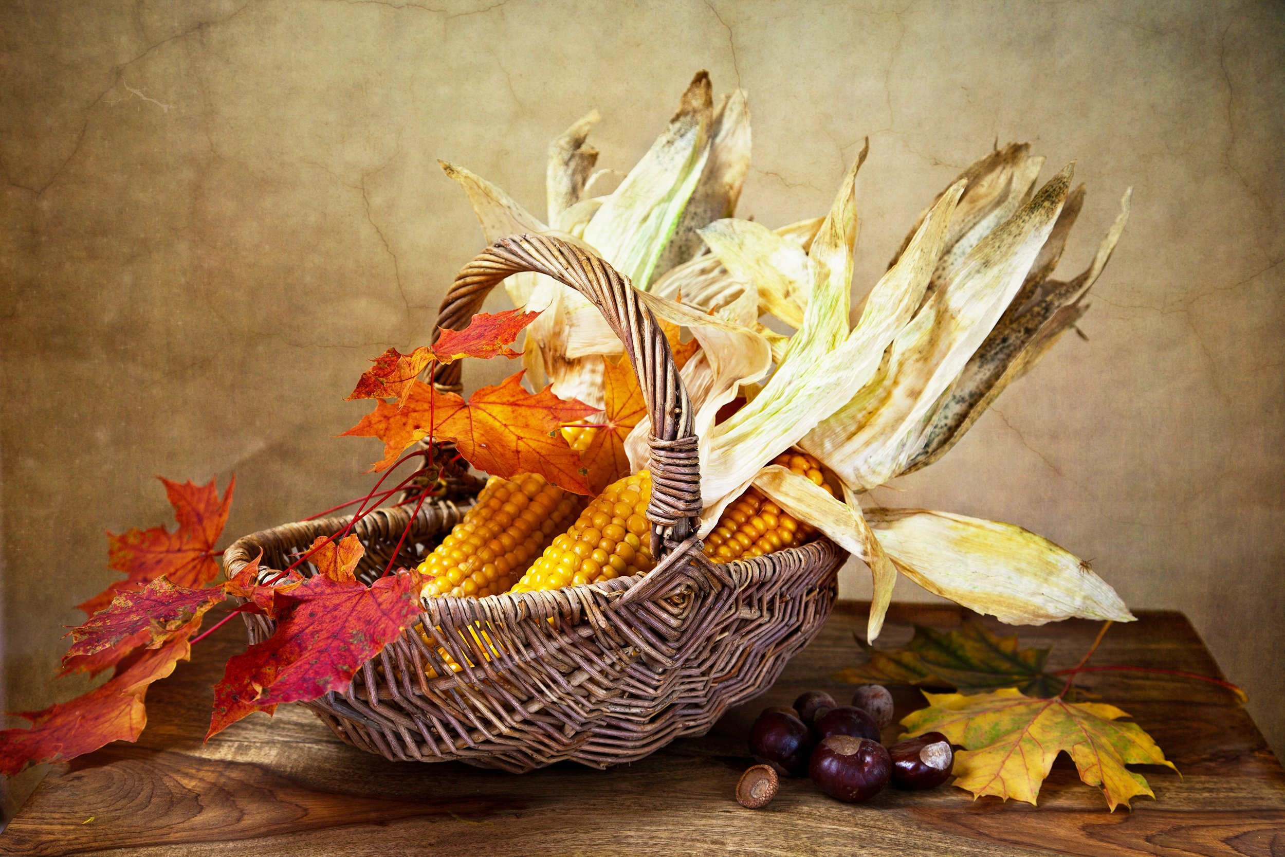 autumn arrangement in wicker basket