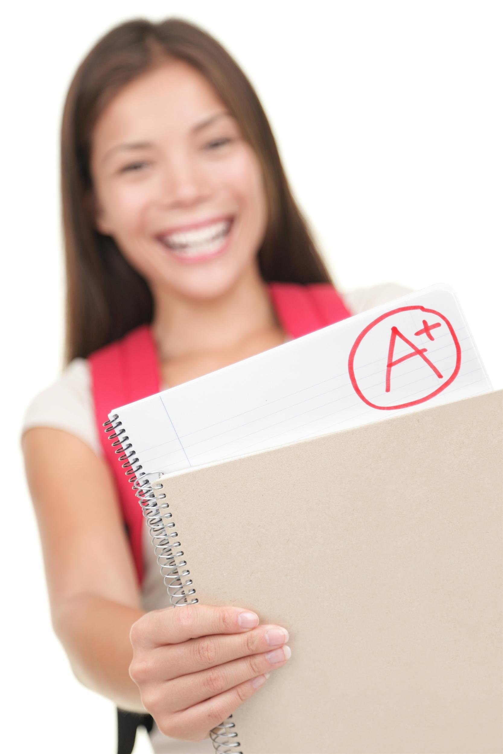 college girl showing A plus paper