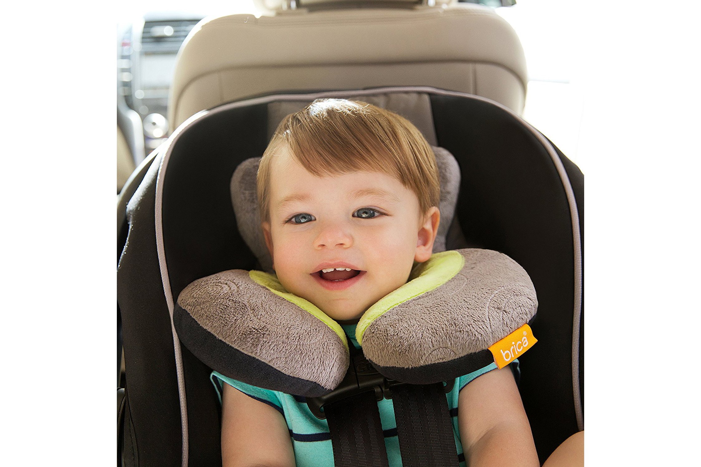 Child in a car seat with protective neck pads