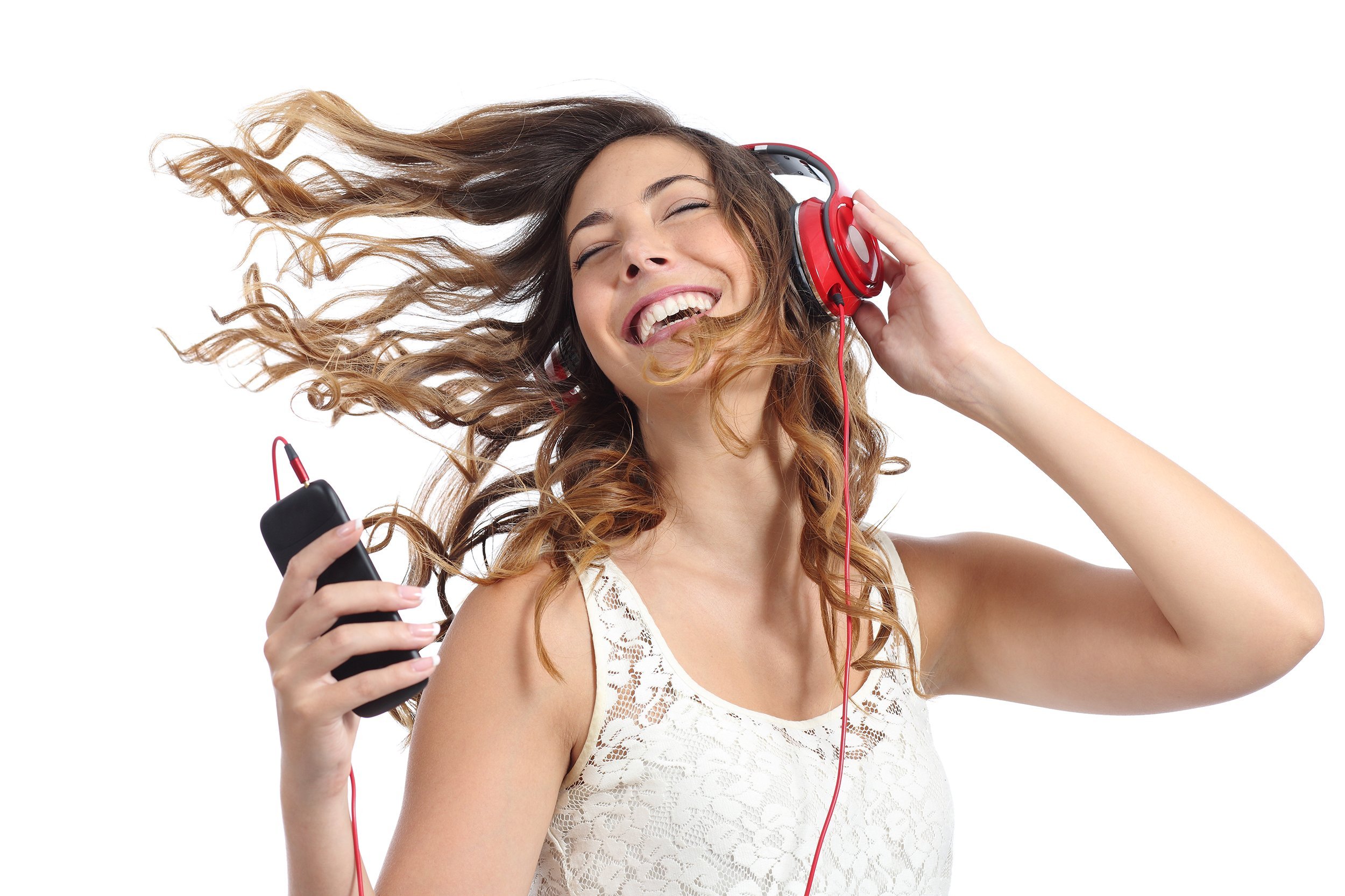 happy girl dancing and listening to the music